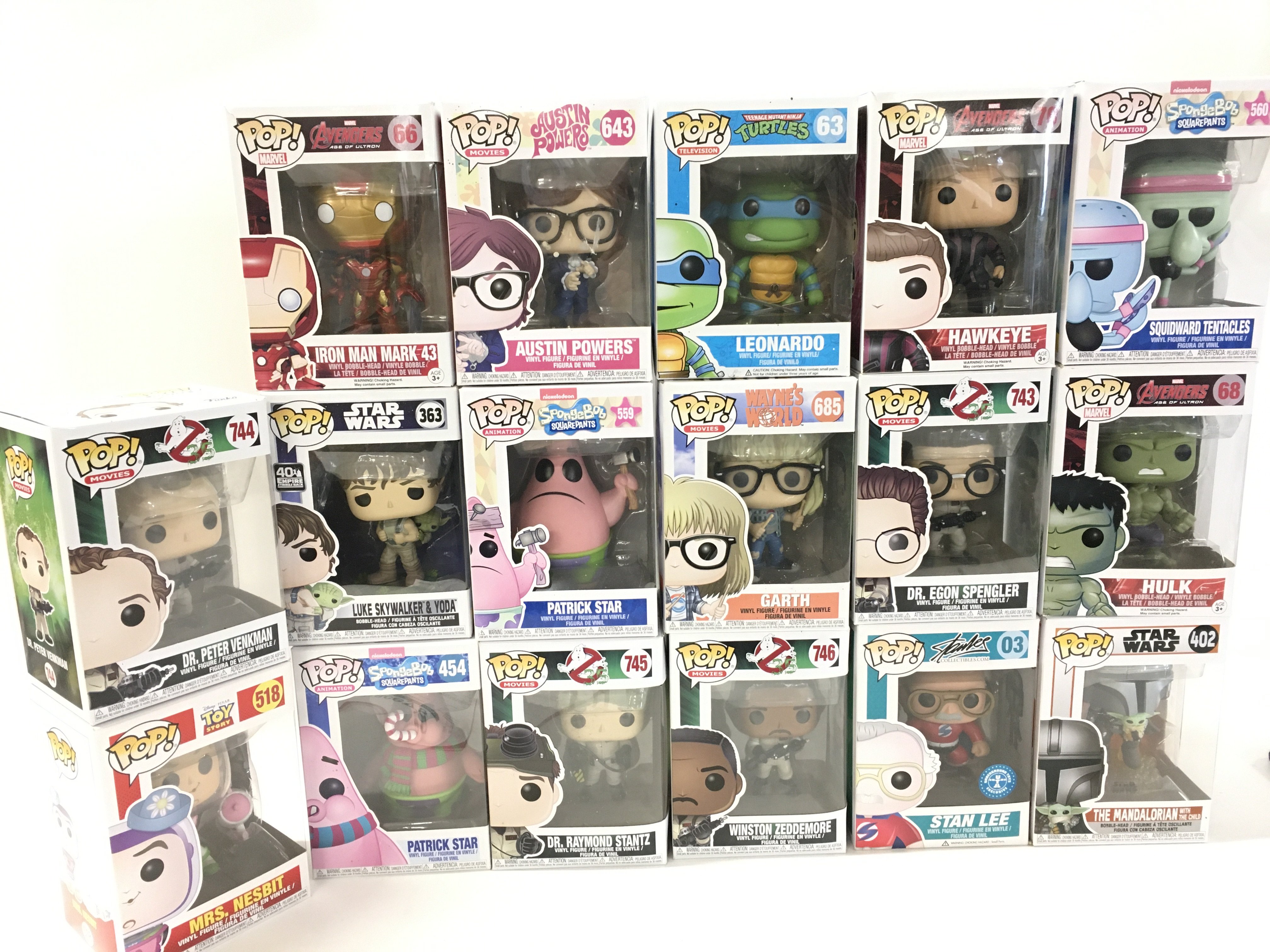 A collection of 17 boxed Funko Pop figures.