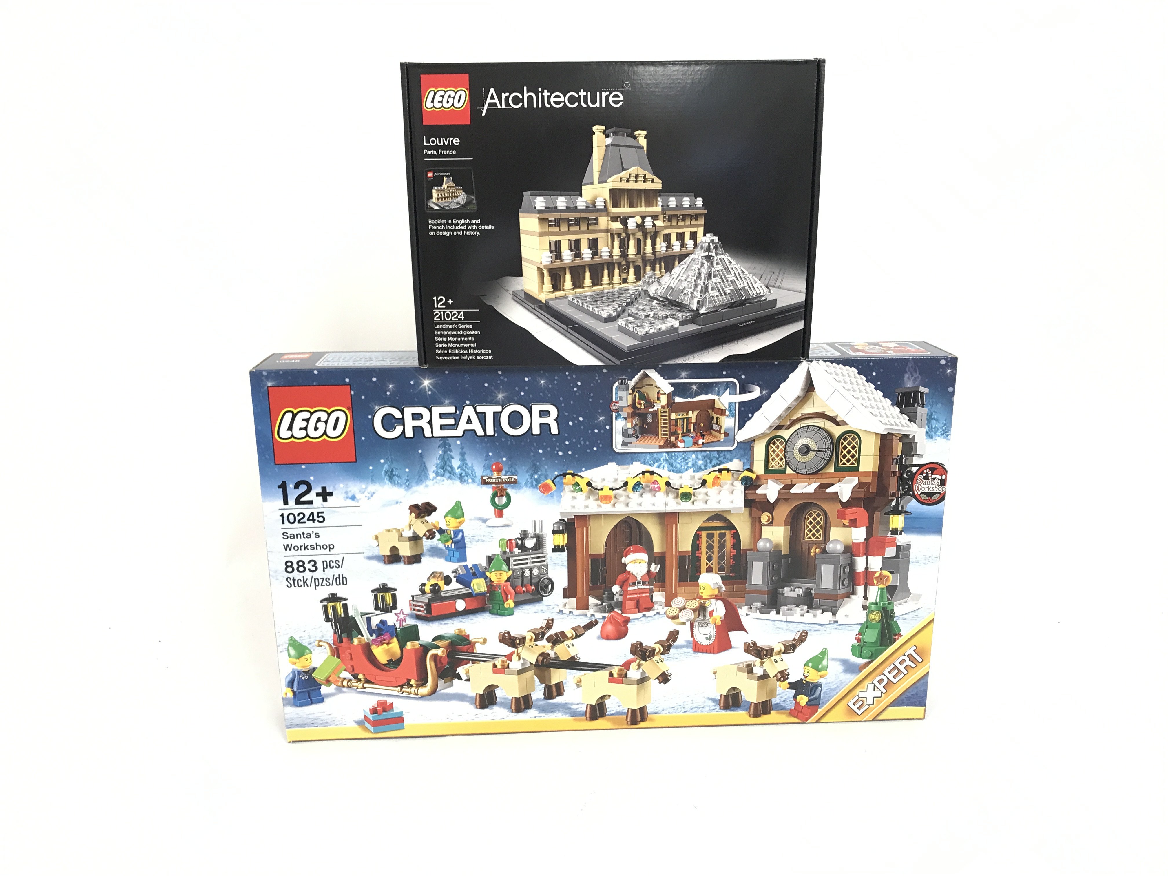 2 boxed and sealed Lego sets. To include 10245 Santas workshop. 21024 Louvre. No reserve.