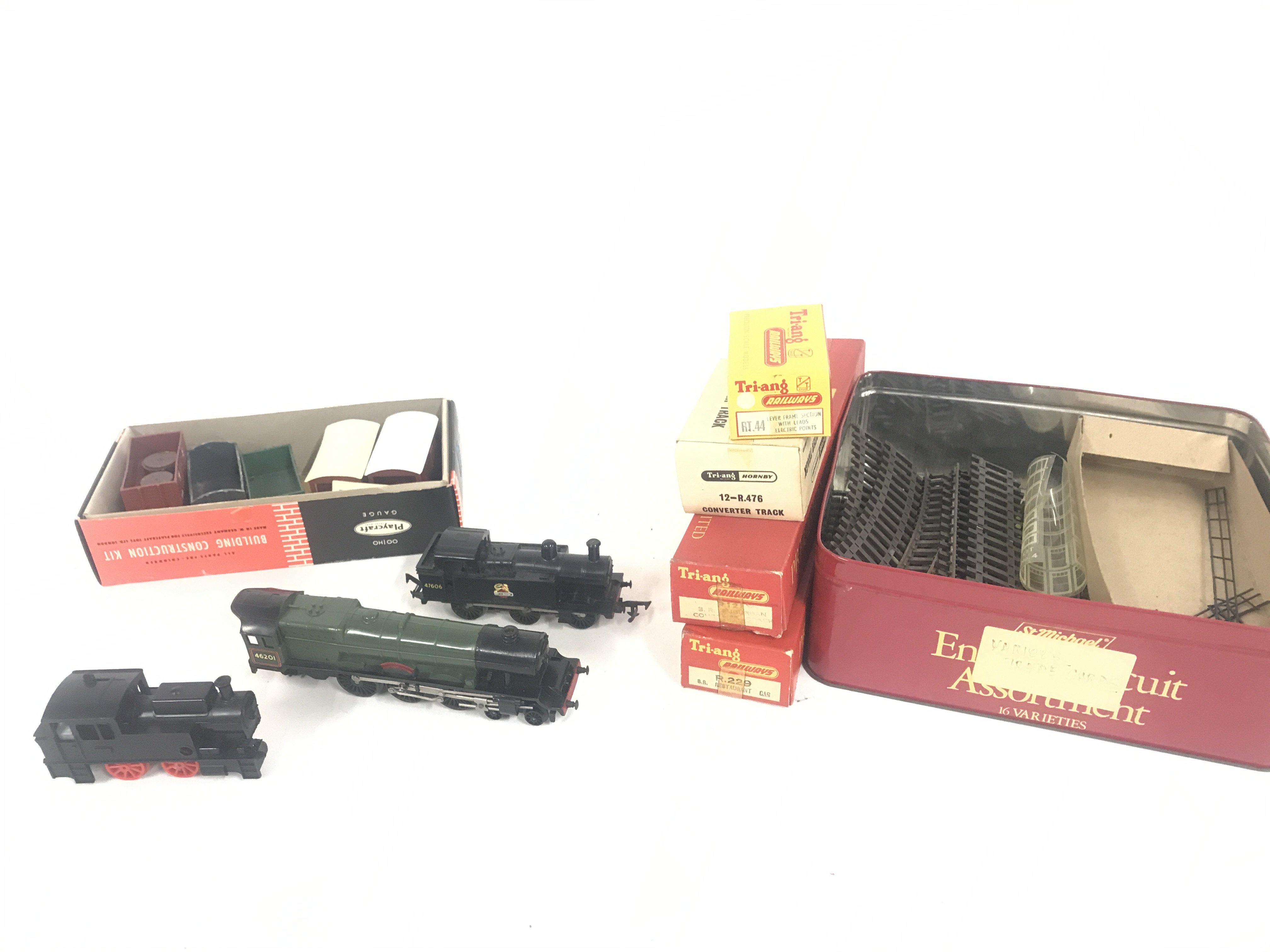 A Small Collection of 00 Gauge Track. Wagons. 2 Electric Locomotives a Clockwork Goods Train A/F. Buildings Accessories Etc.(2).