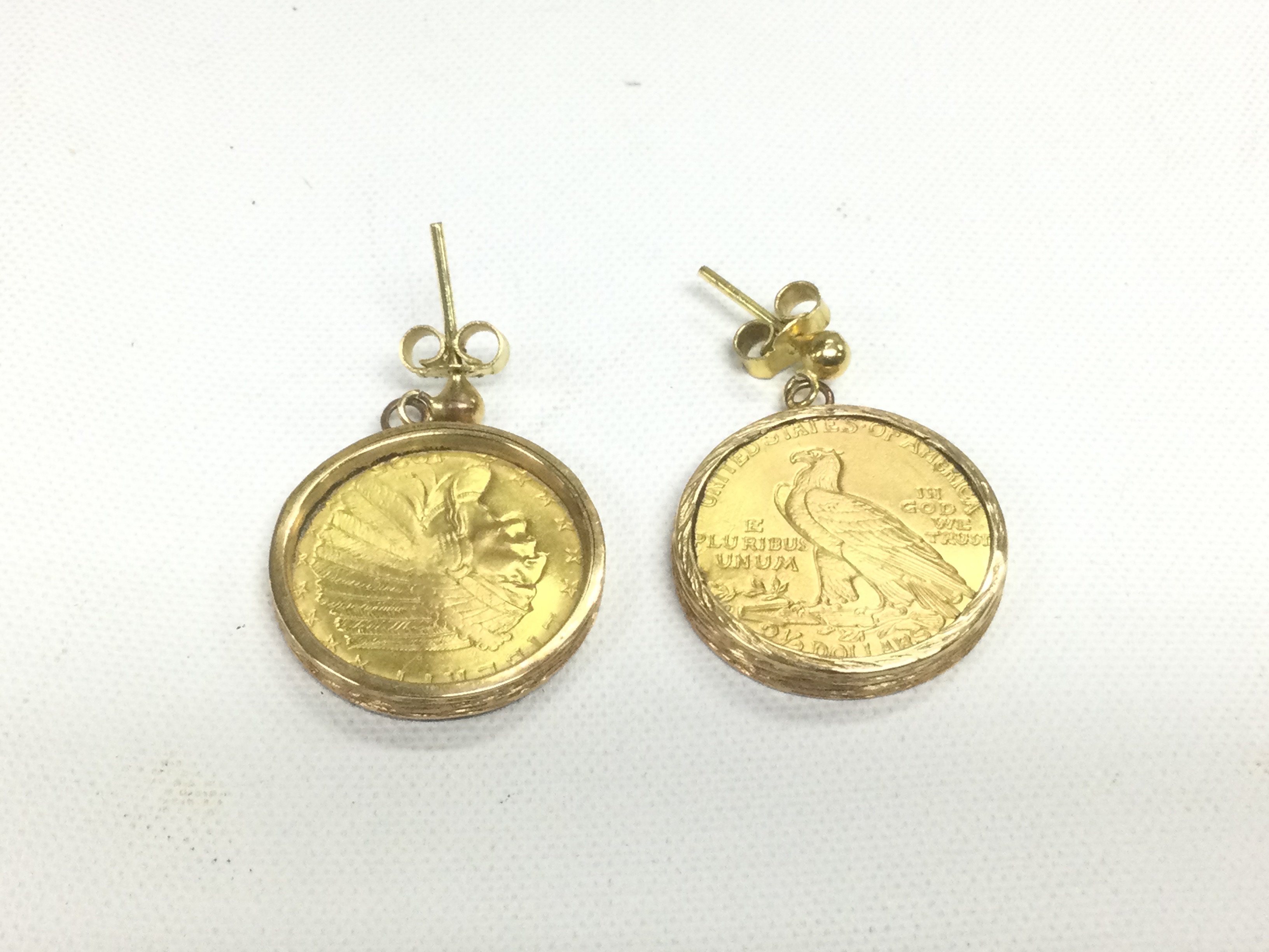 A pair of American gold coin earrings set in gold mounts, approx 12.2g. Shipping category A.