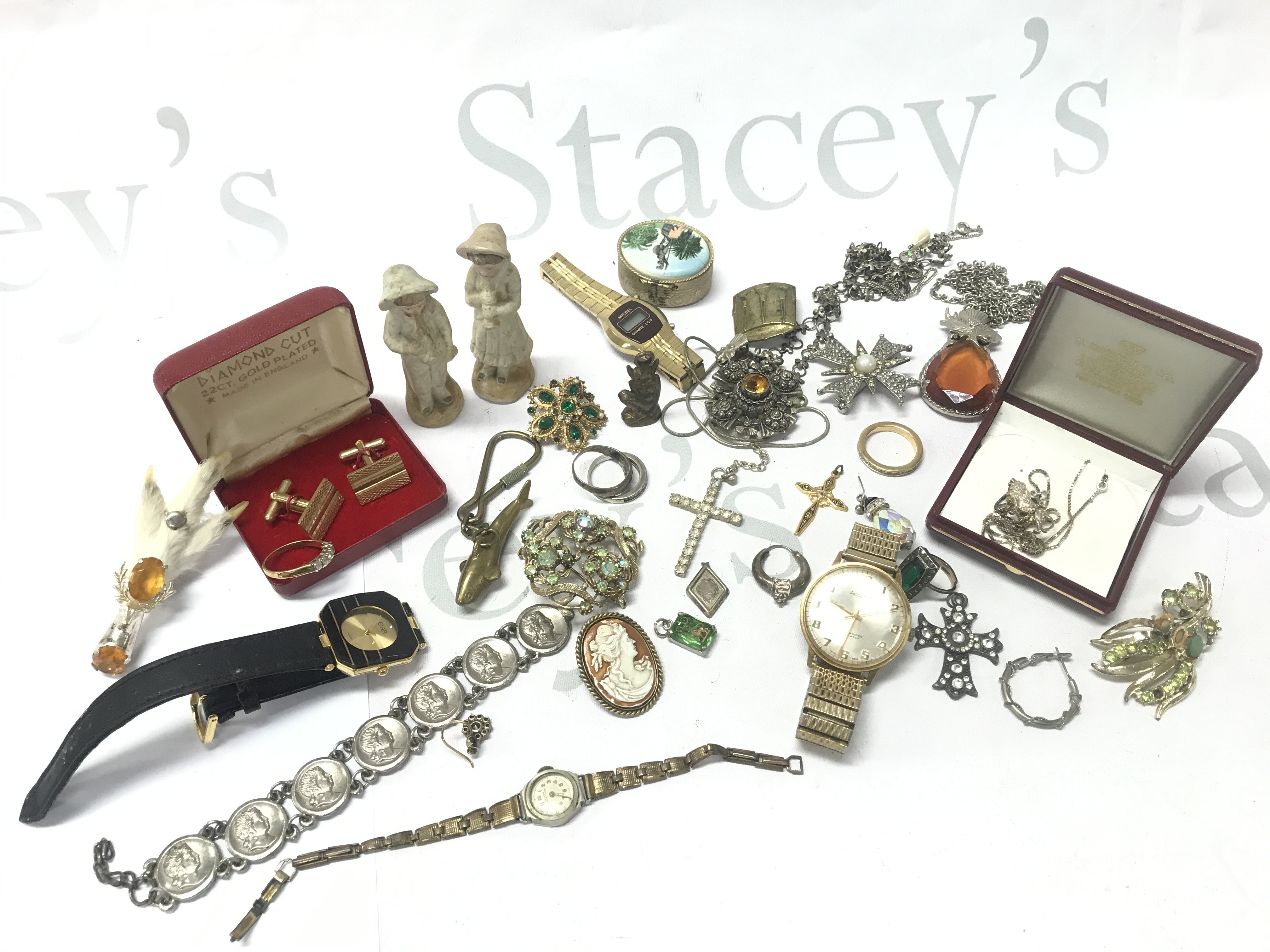 A collection of assorted costume jewellery including a number of silver examples. Postage B