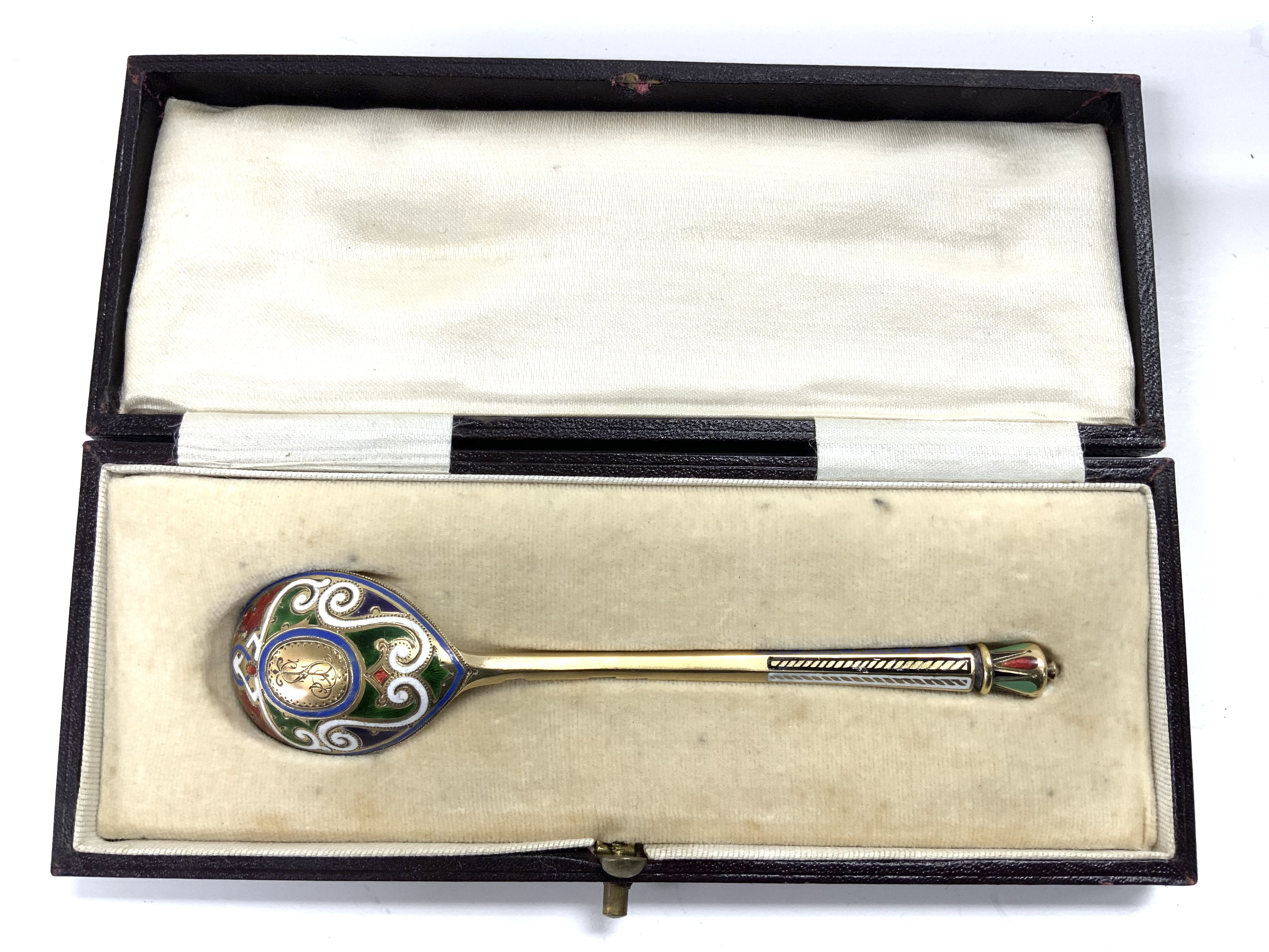 A Russian silver gilt and enamel spoon, with marks for Viktor Vasilyevich Savinsky, Moscow 1874, fitted case. (B)
