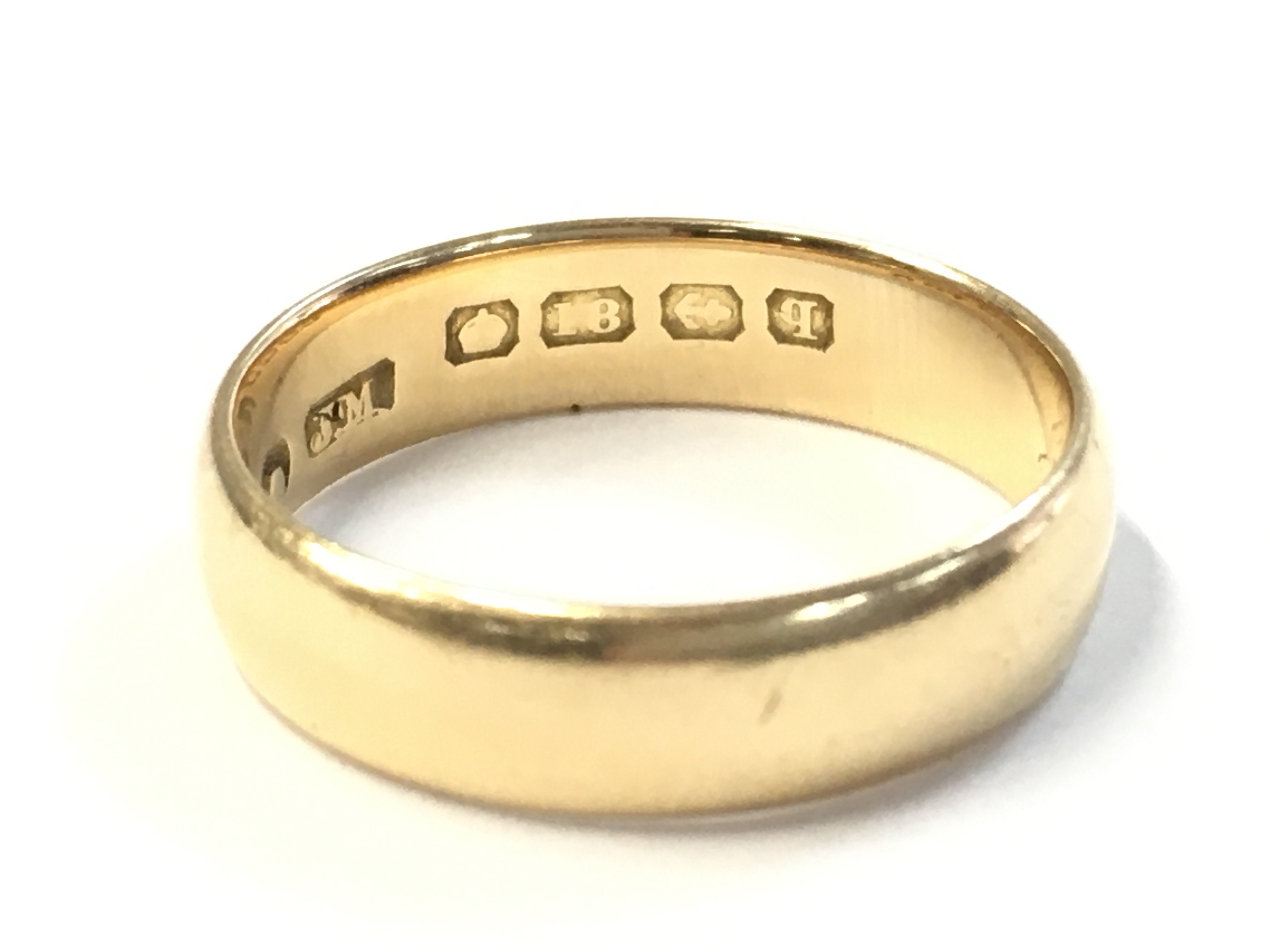 An 18ct gold ring , 6.2g total weight. size U postage cat a