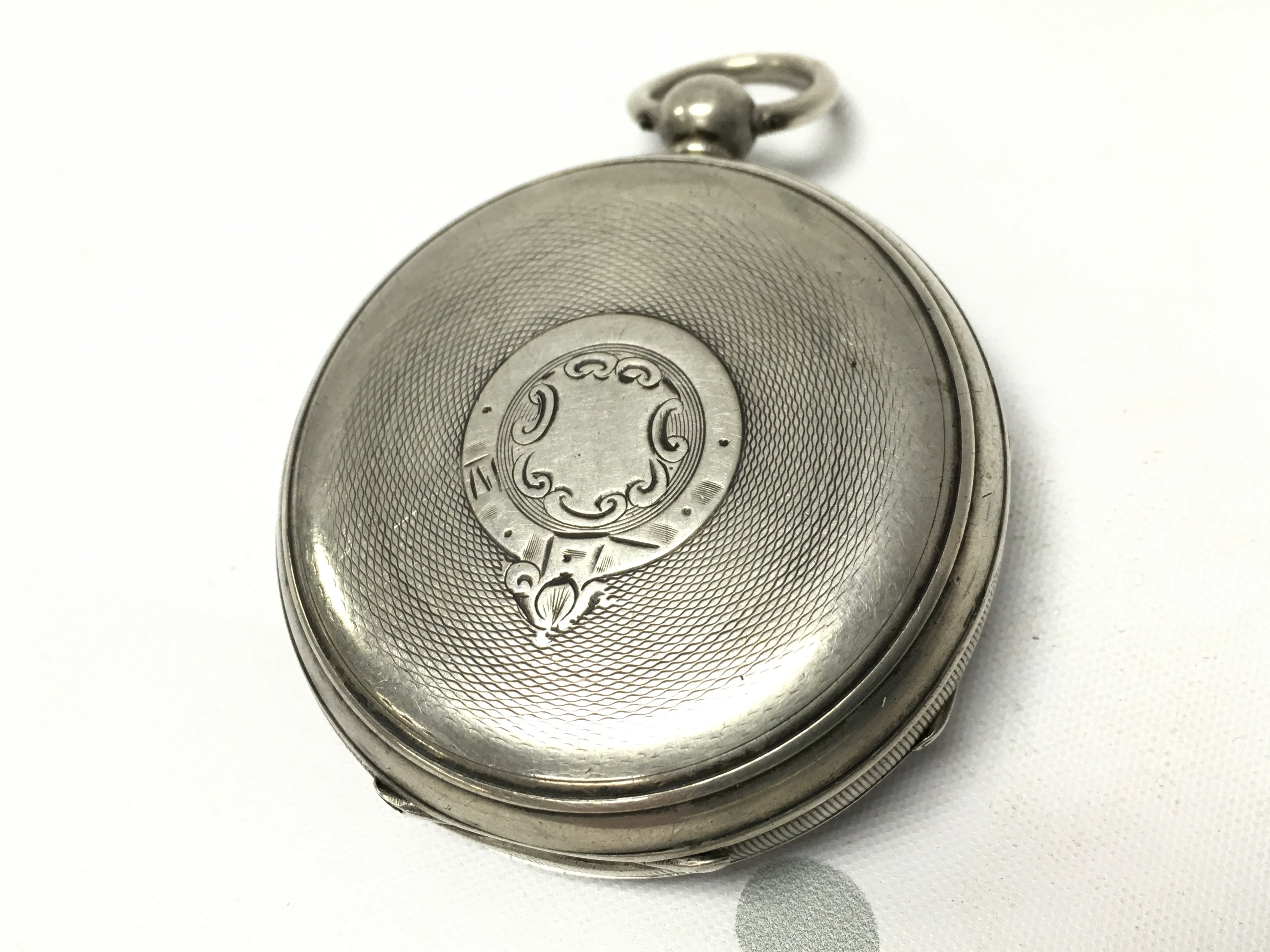 A silver hallmarked cased pocket watch , seen working. Postage category A