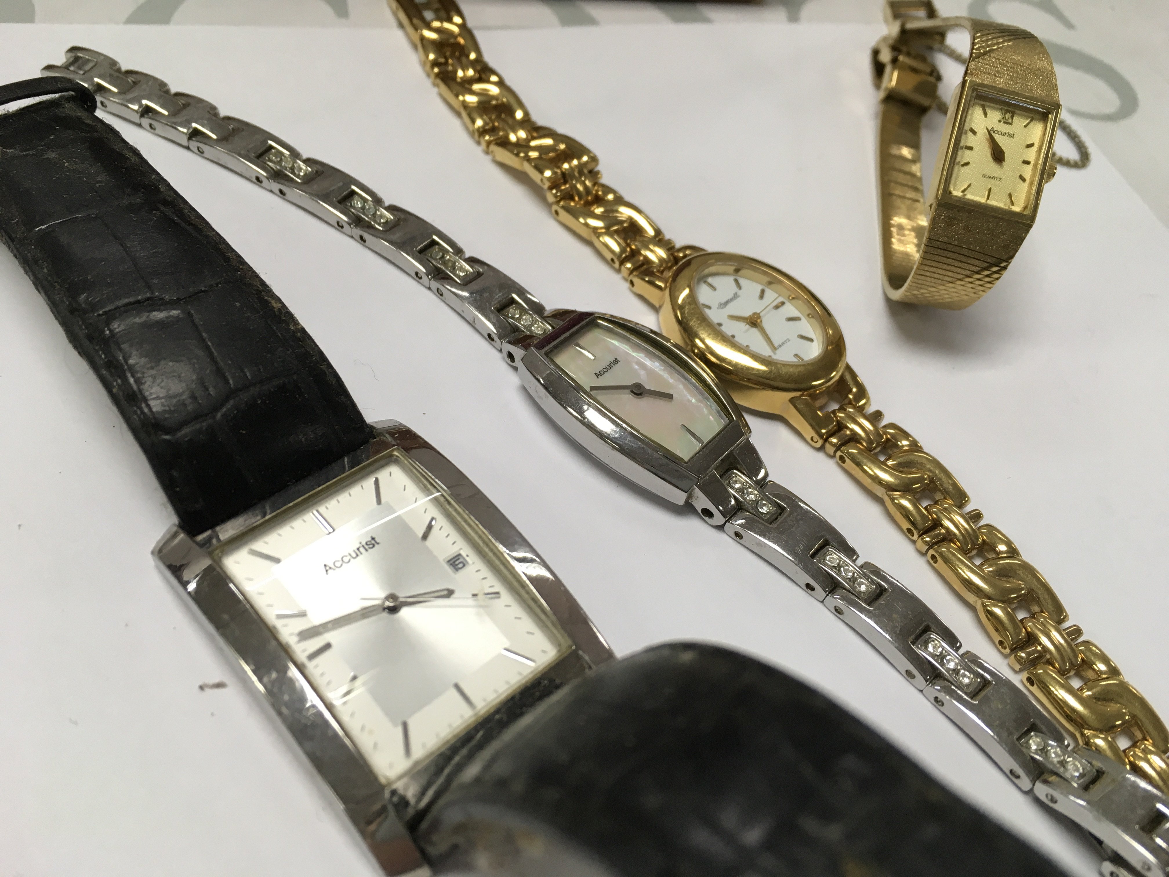 A box of watches including Accurist, Avia, Sekonda, Ingersoll . Postage category B- NO RESERVE