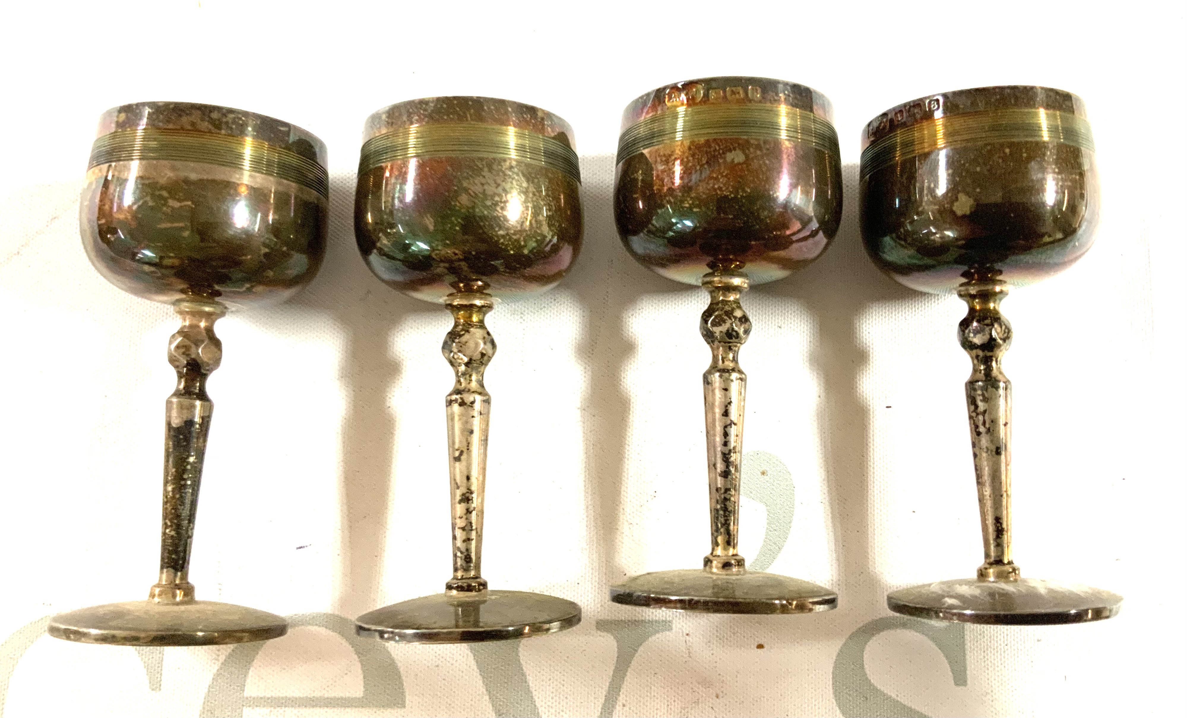 4 small hallmarked silver liquor goblets. (A)