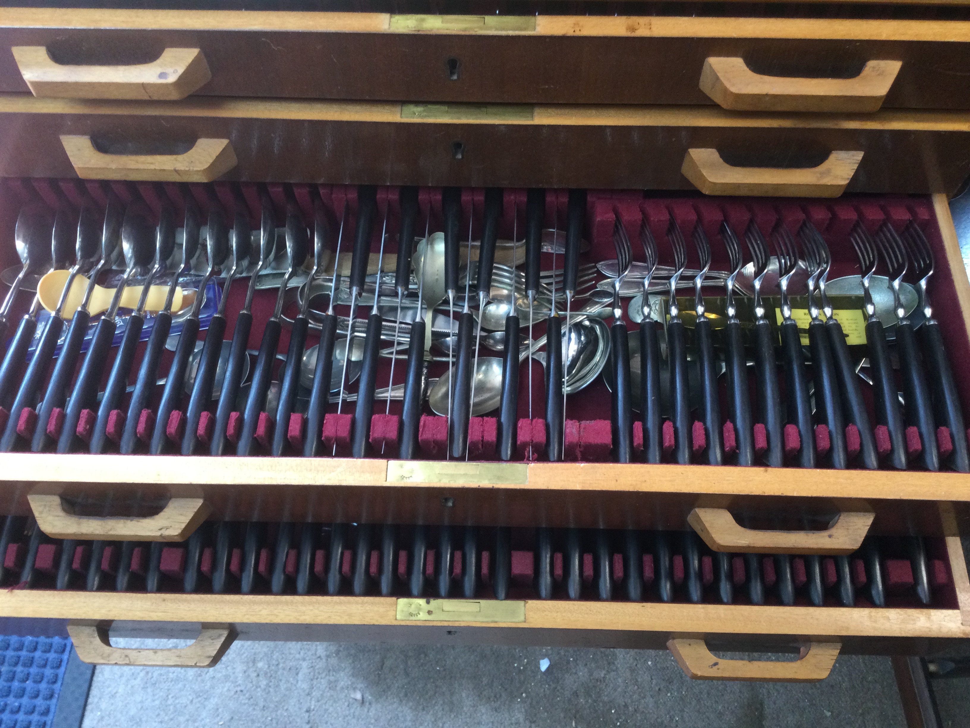 A freestanding Grenadilla canteen of cutlery. Shipping category D.