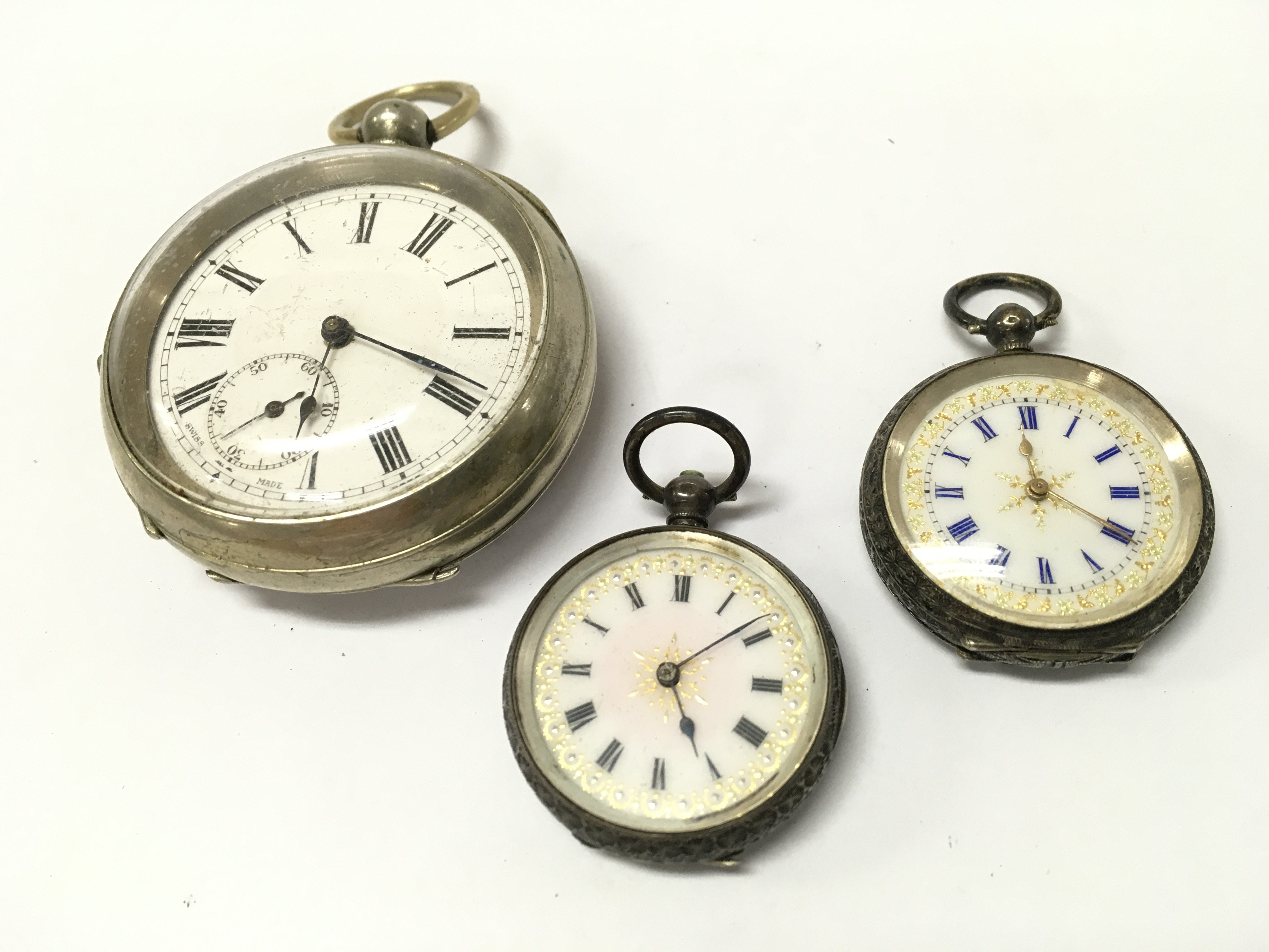 Three pocket watches including two small silver cased, no reserve