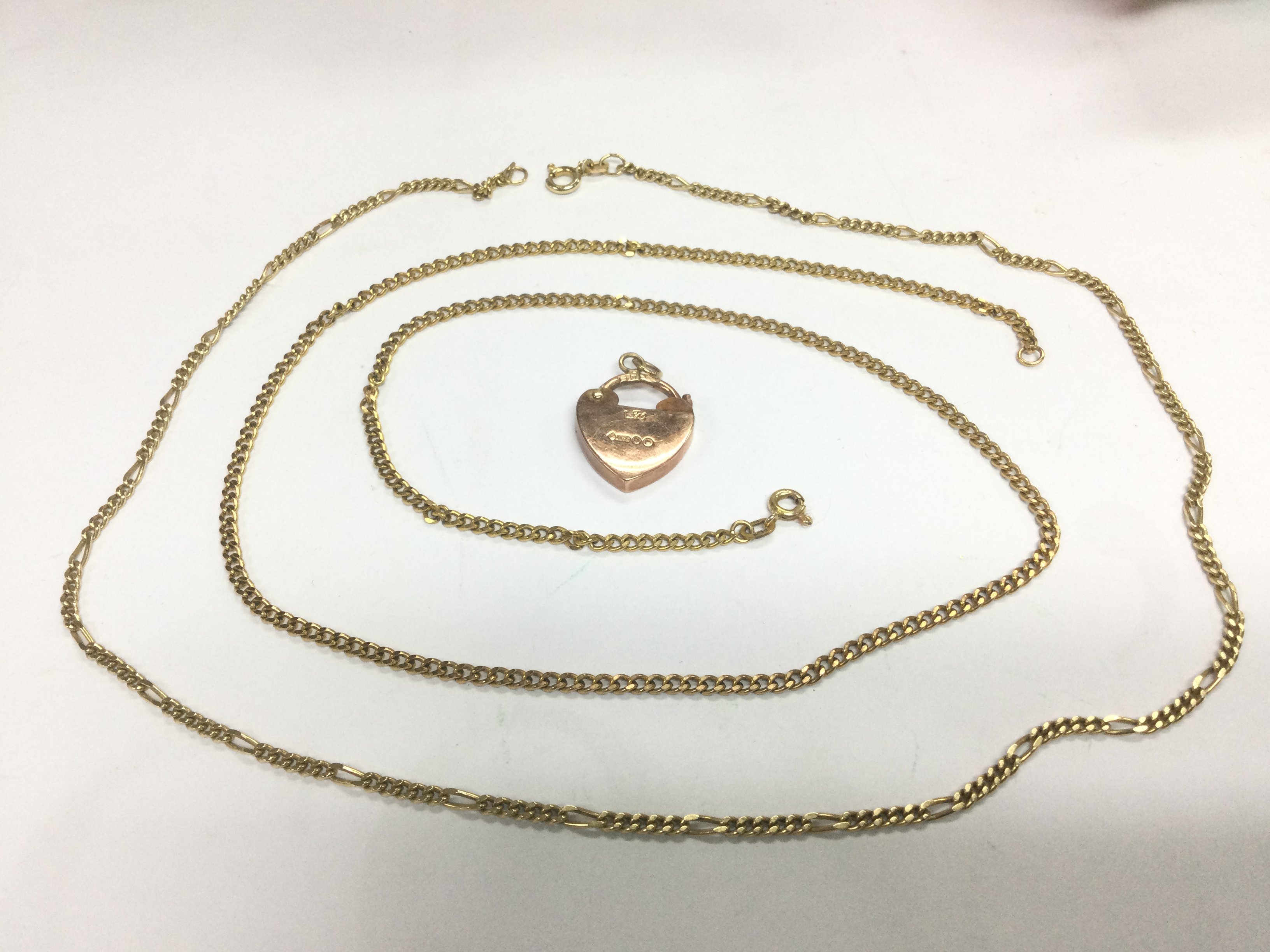 Two 9ct gold chains and a 9ct rose gold padlock clasp, total approx weight 17g. Shipping category A.