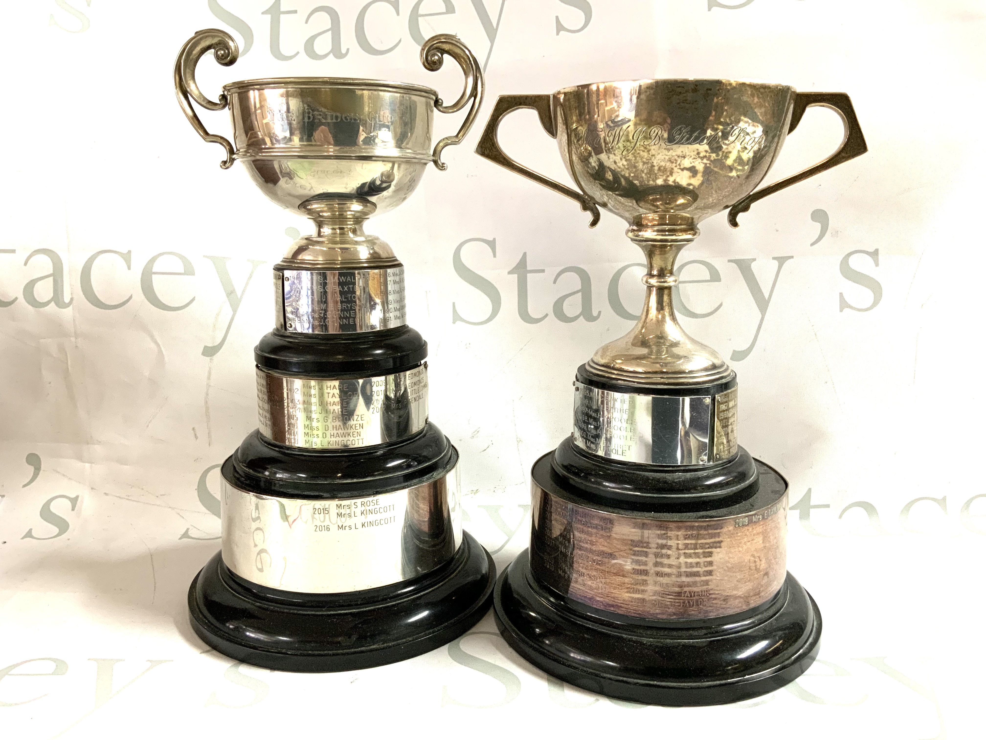 2 hallmarked silver trophy cups with bases. 26cm /29cm
