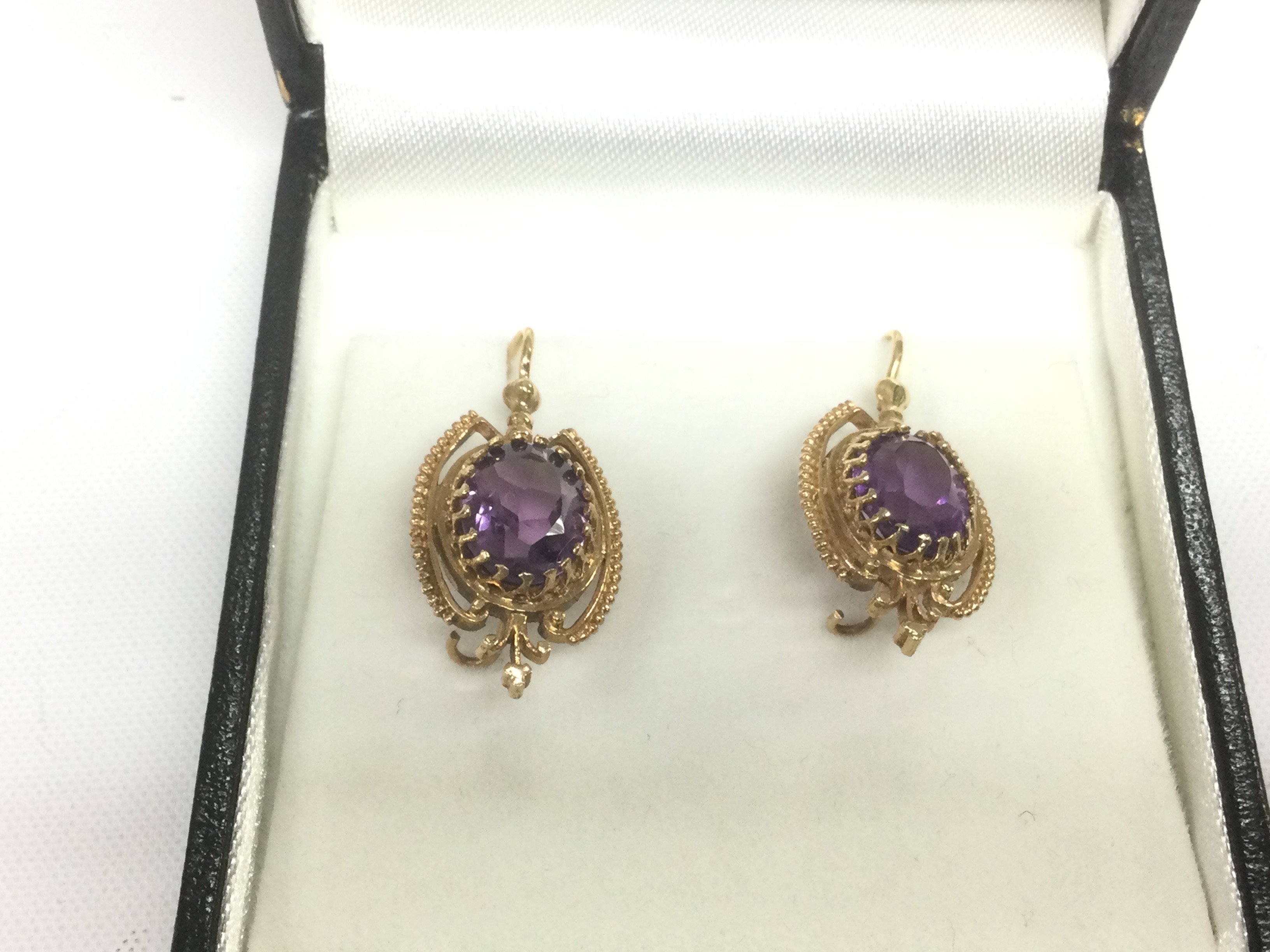 A pair of 9ct gold amethyst earrings, approx 4.7g. Shipping category A.
