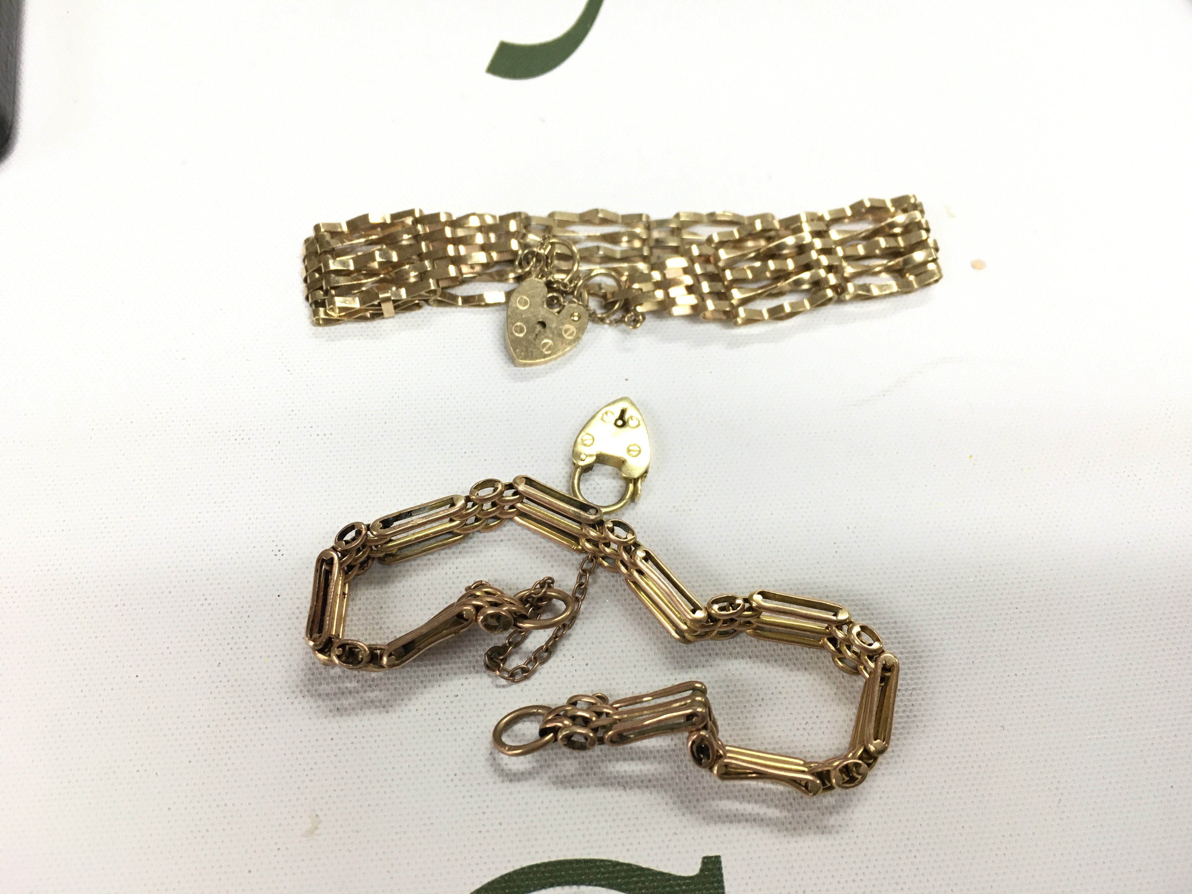 Two 9ct gold gate bracelets. Approx weight 14.90 grams.