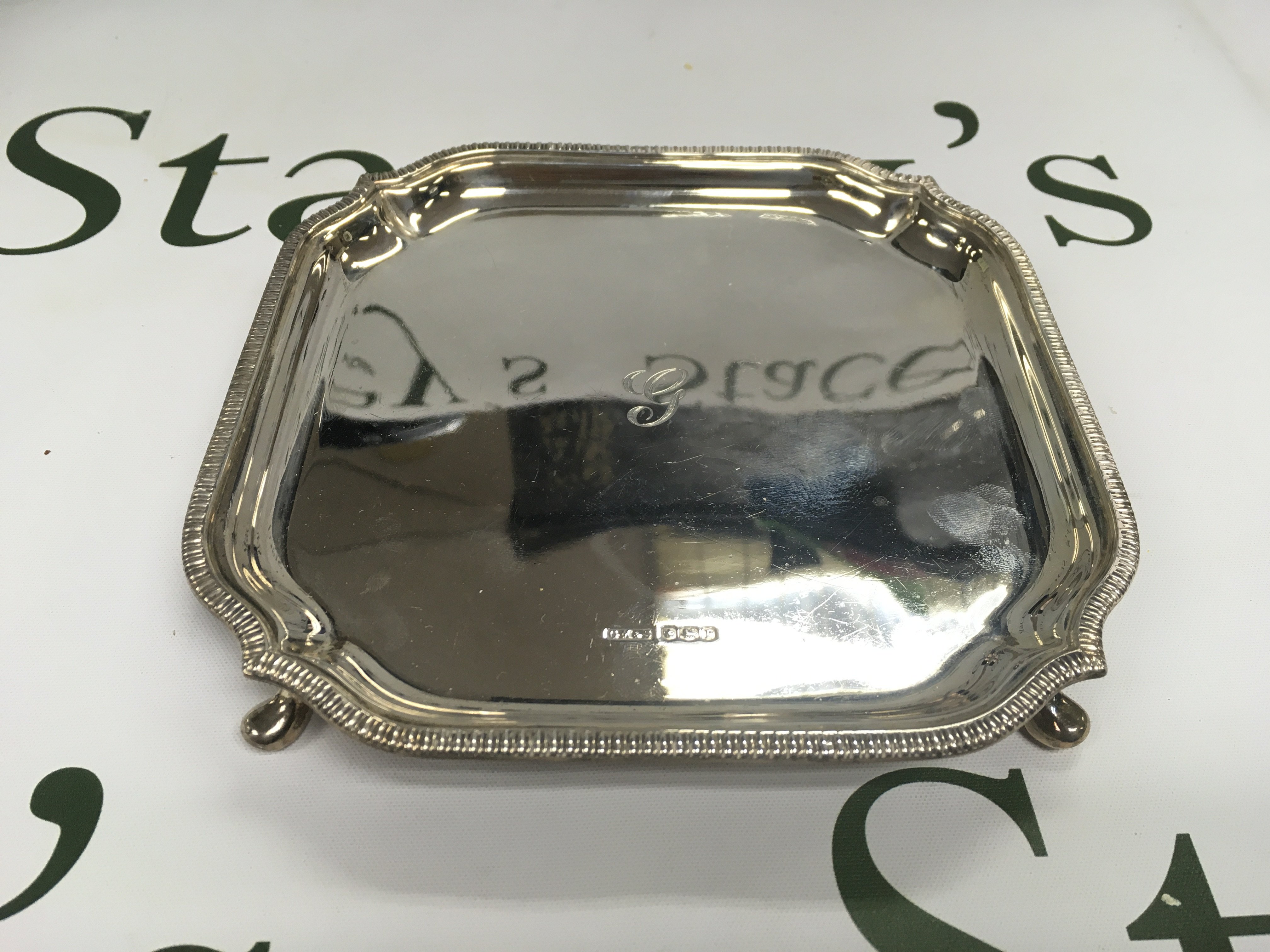 A small silver hallmarked tray.