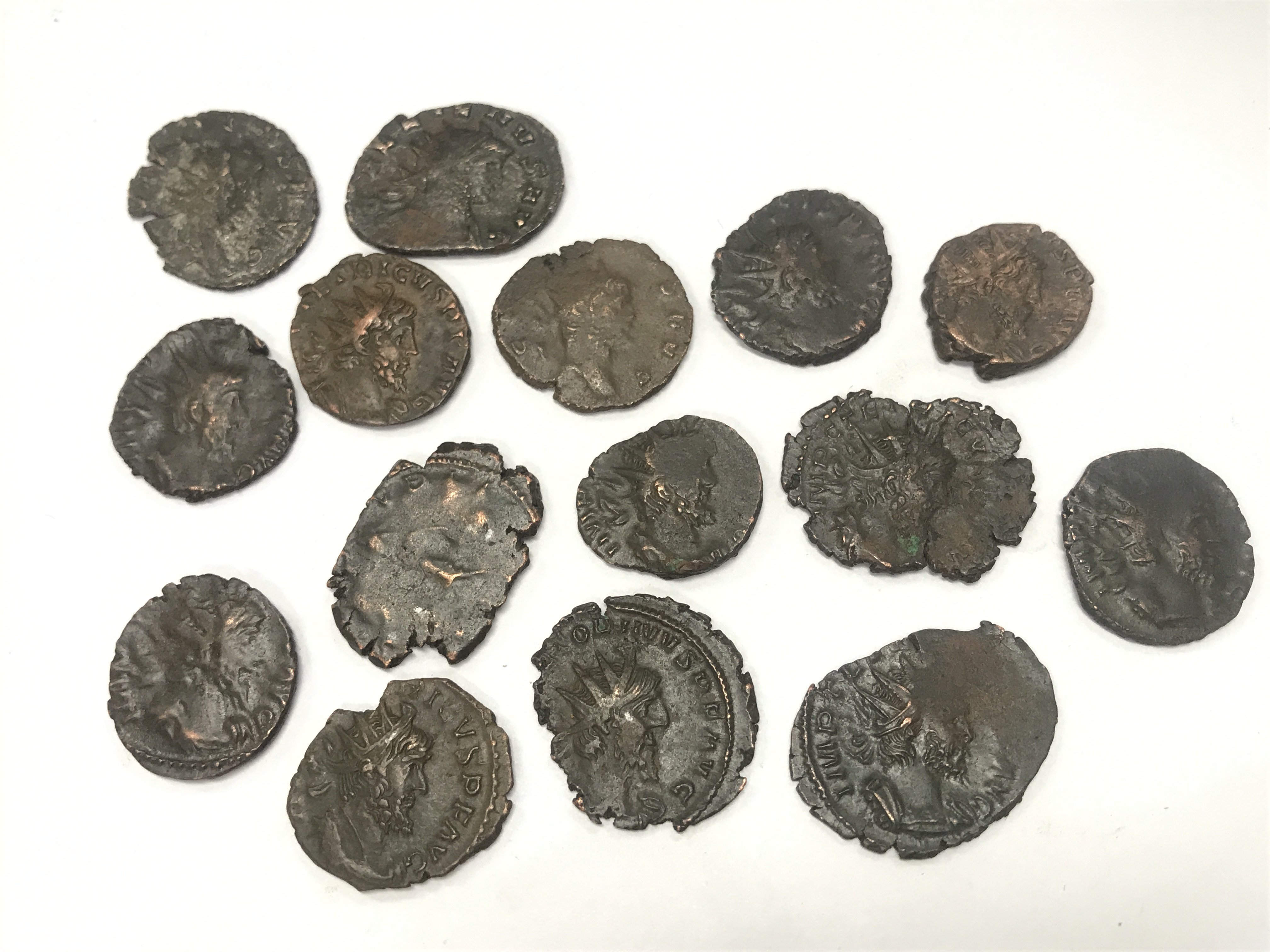A collection of Bronze Roman coins including Gladius II 268-270AD high grade coins , uncleaned coins. Postage category A