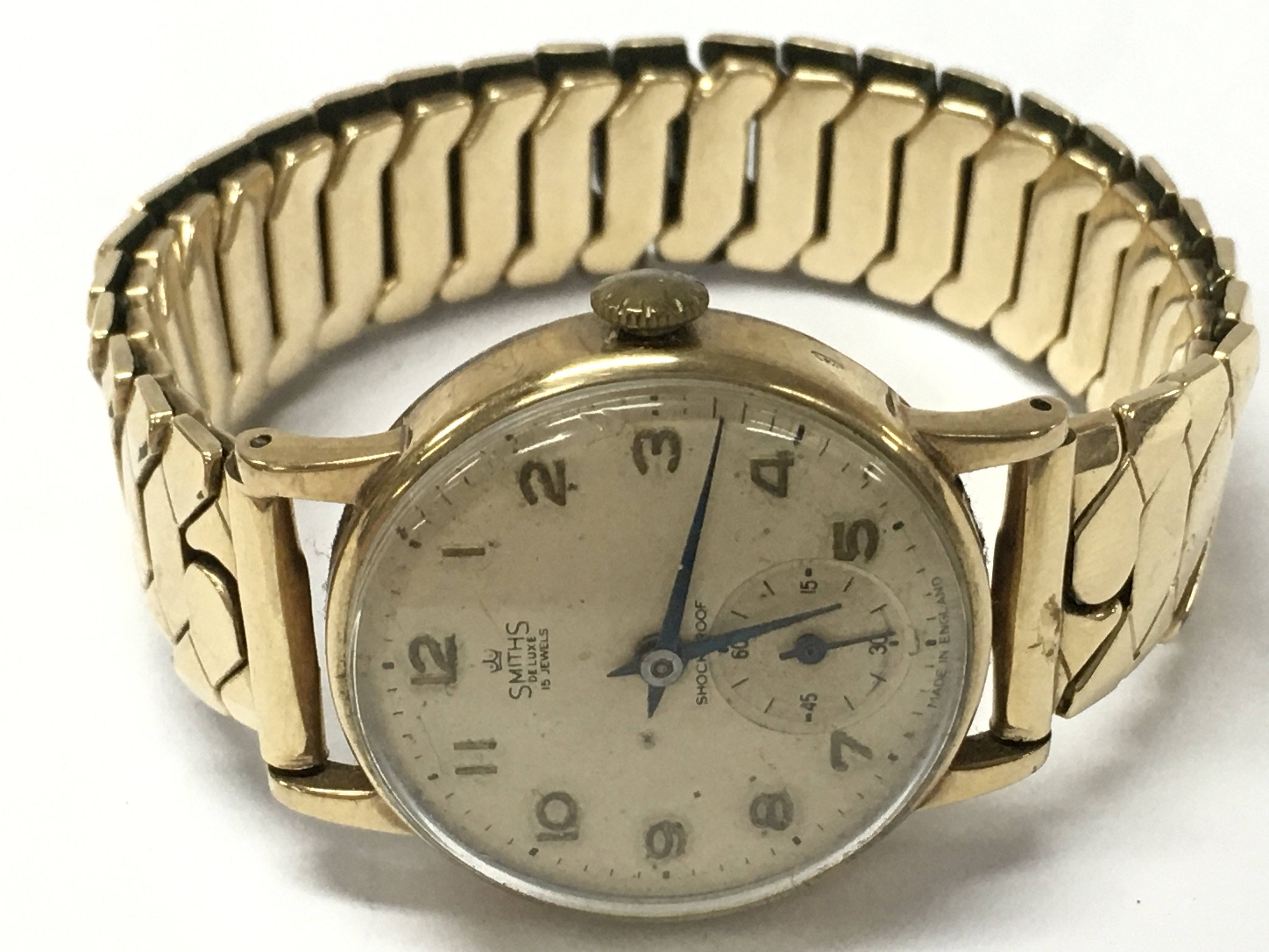 Vintage Smiths watch with a 9ct gold plated strap , postage category A