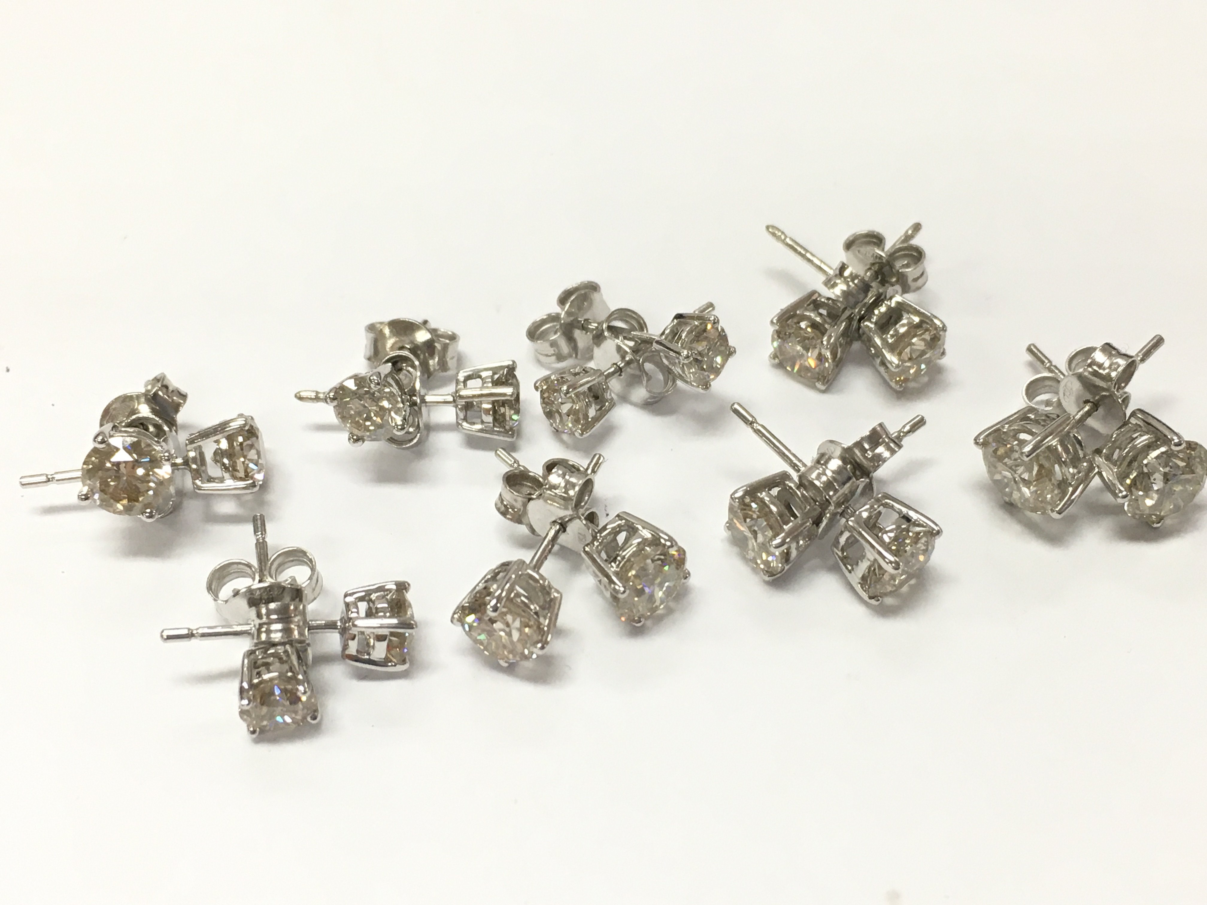 18ct white gold diamond stud earrings. Total weight 12.2g Postage category A