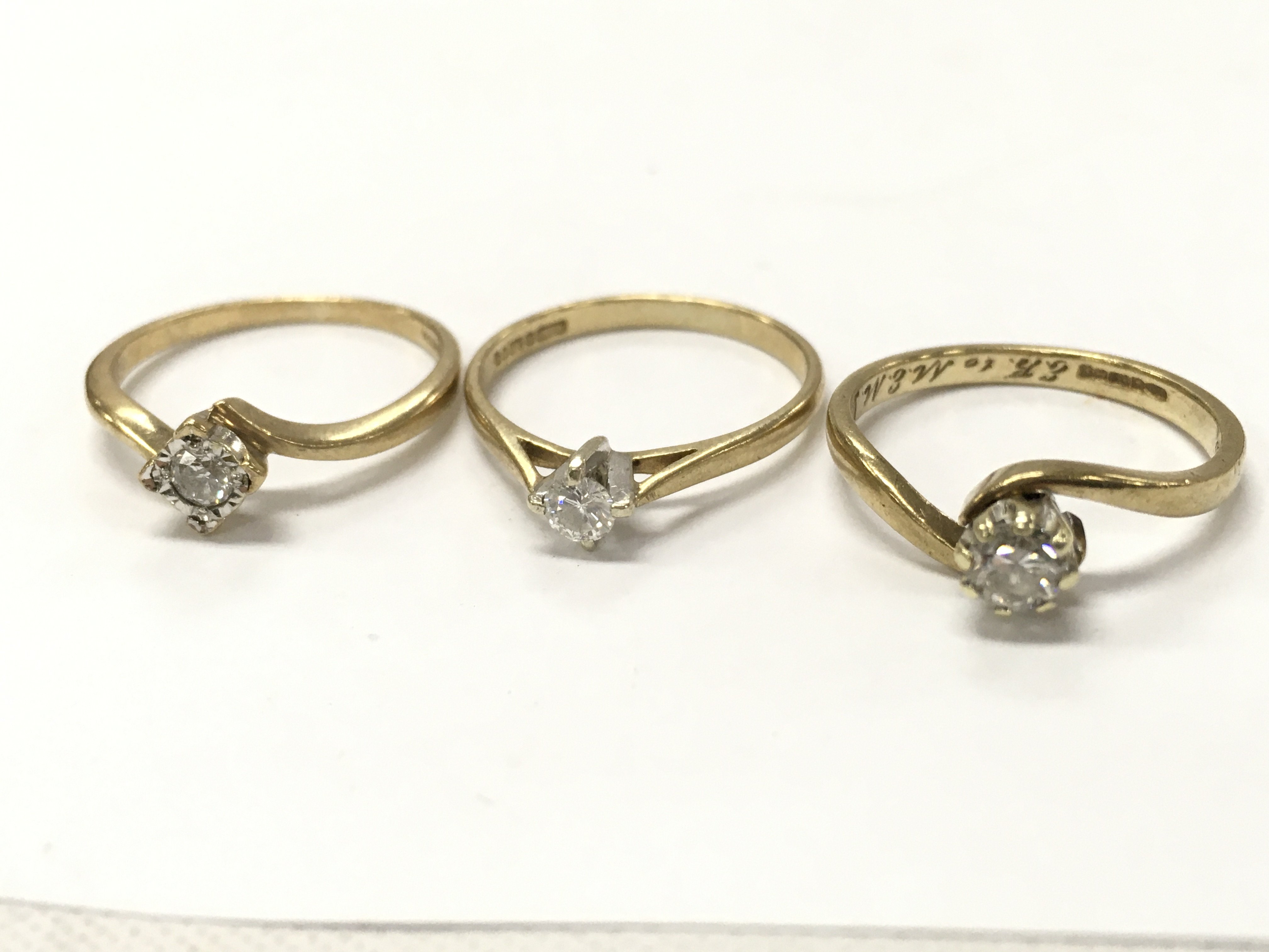 9ct gold diamond solitaire rings , 4.6g total weight. Size L. Postage category A