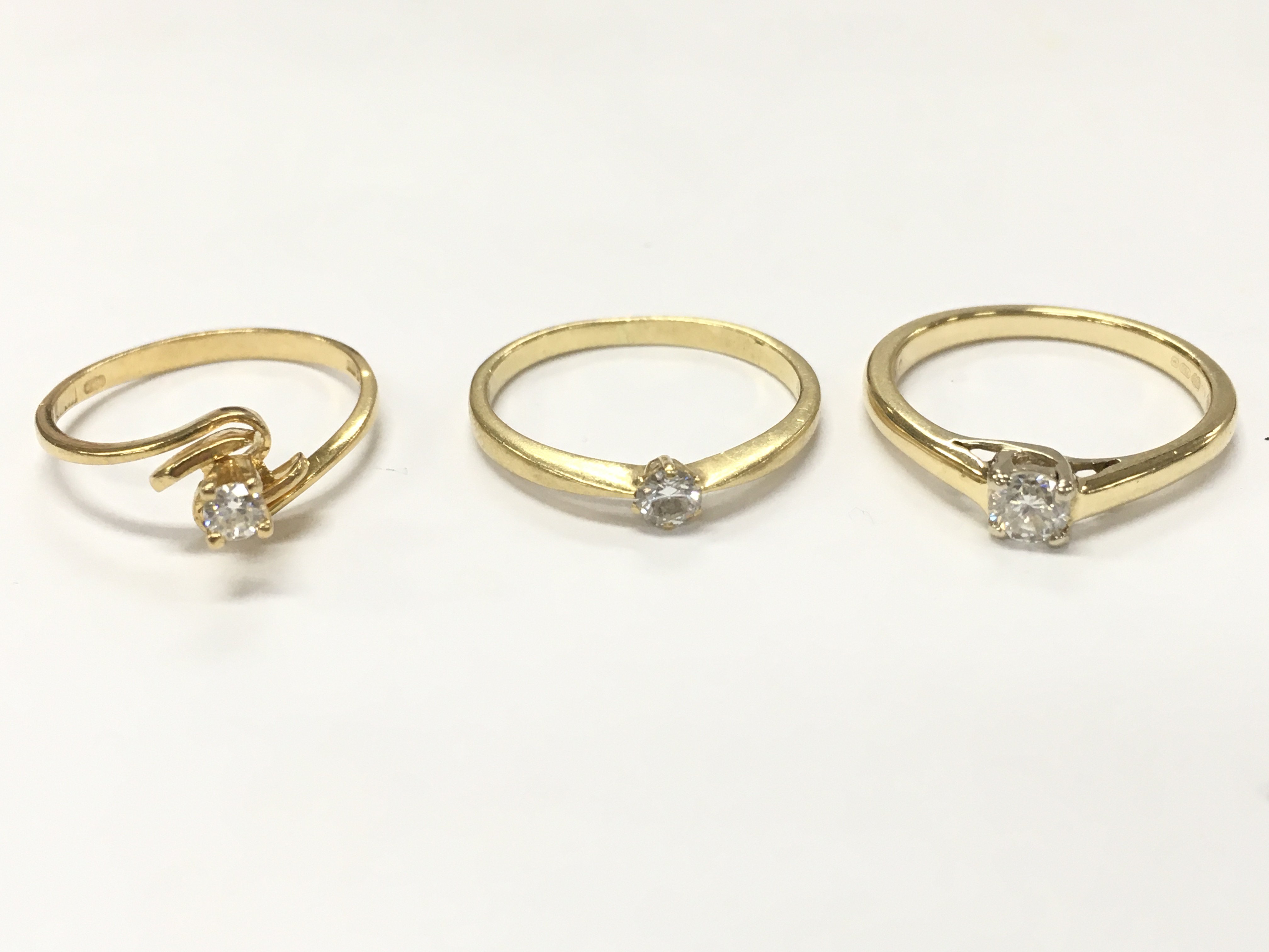 18ct gold solitaire diamond rings , size L, 6.3G total weight. Postage category A