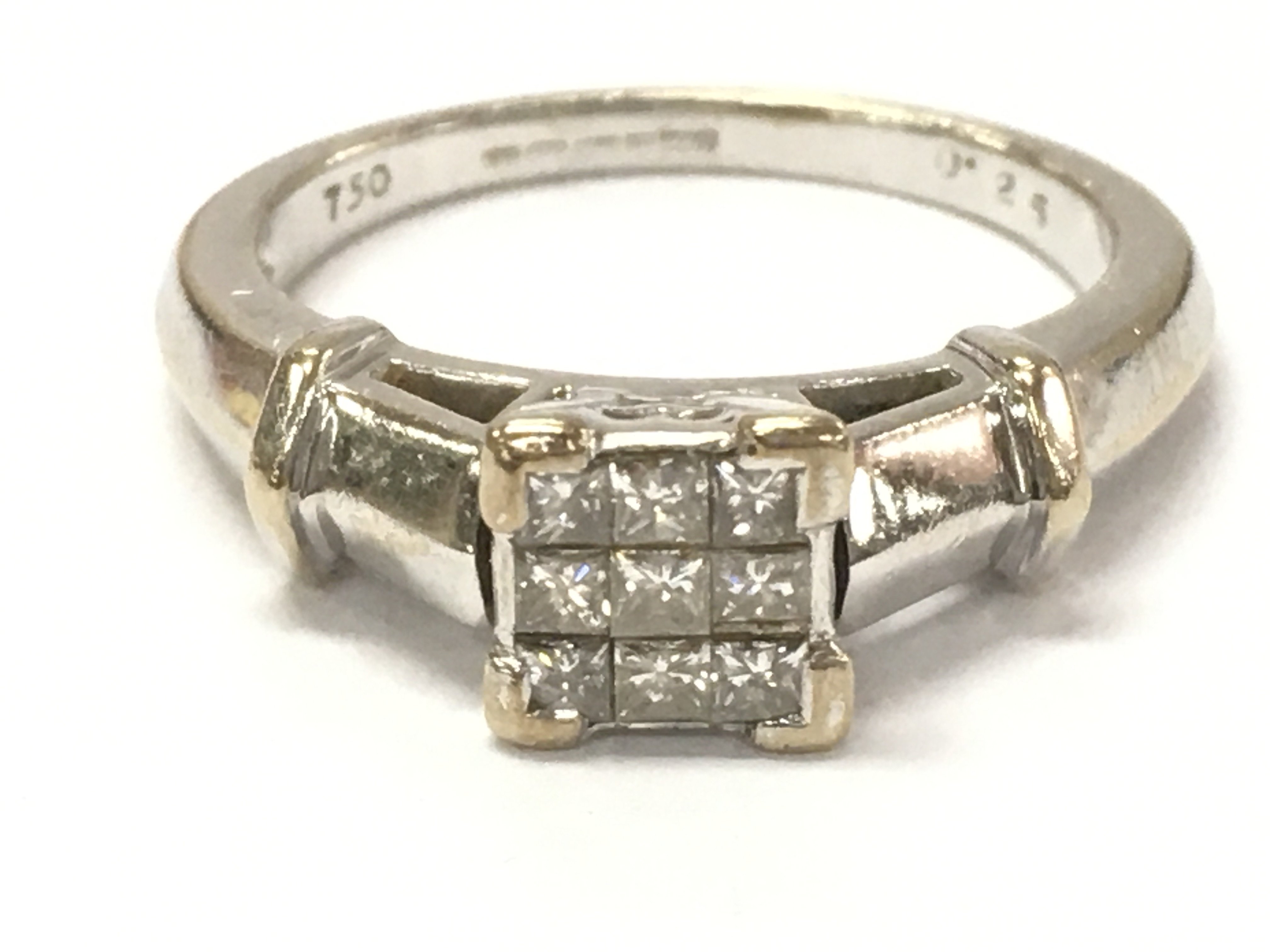 An 18ct White gold 9x princess cut diamond cluster ring 1/4ct. Size Q. 5.2g total weight.