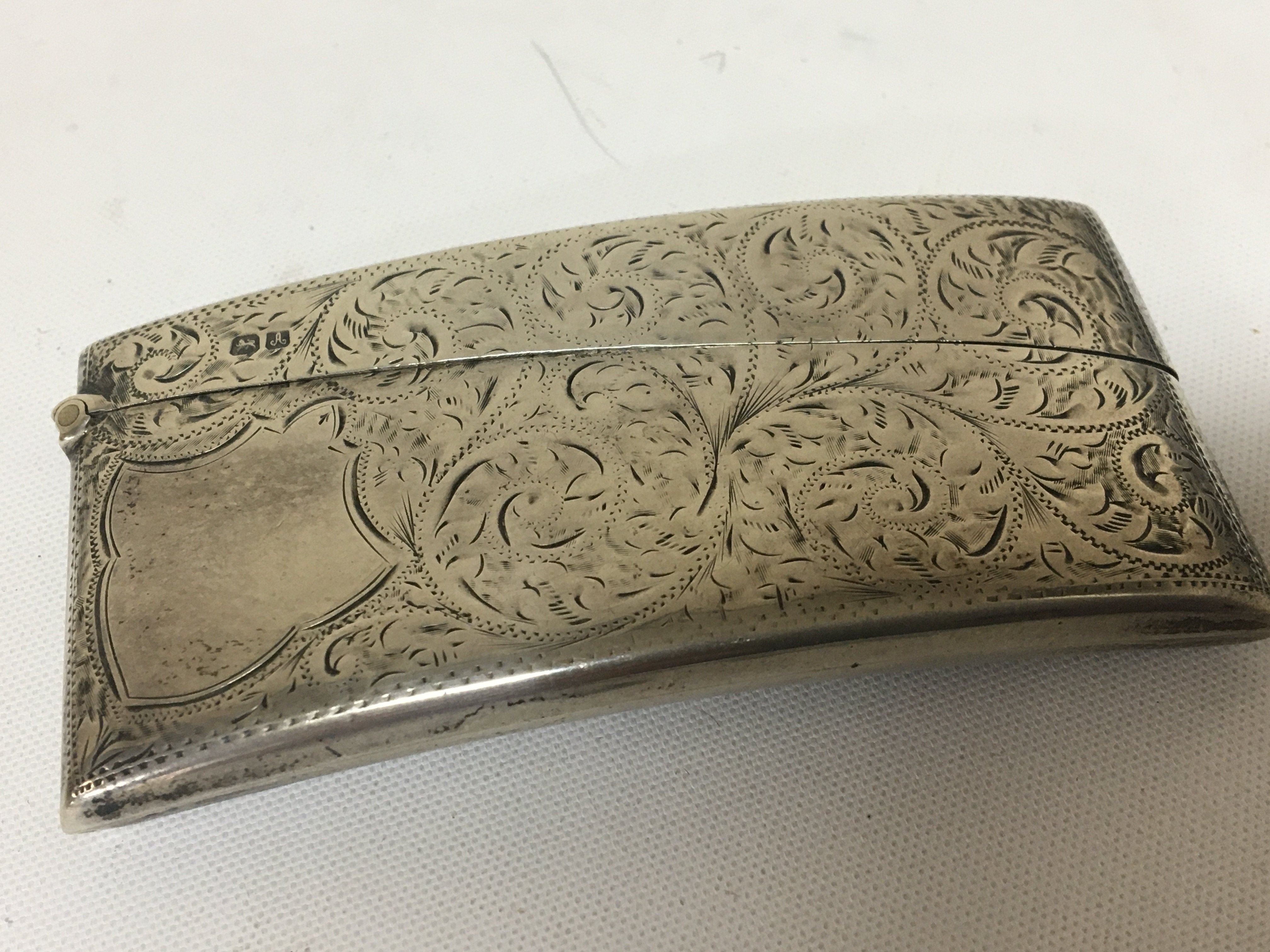 A Nice Example of an Edwardian Silver Card case with engraved scroll pattern Chester Hallmarks.