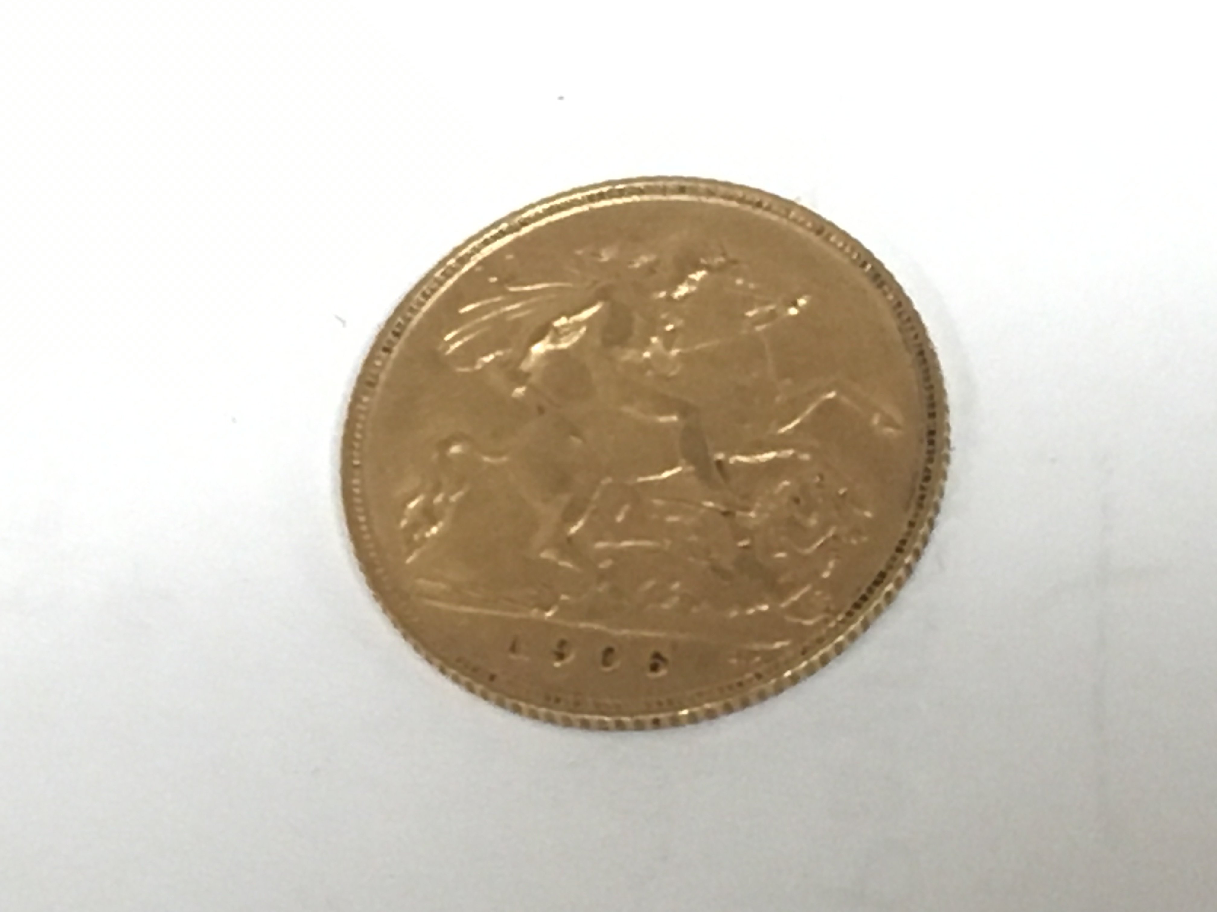 A Gold Edward VII 1906 half Sovereign.