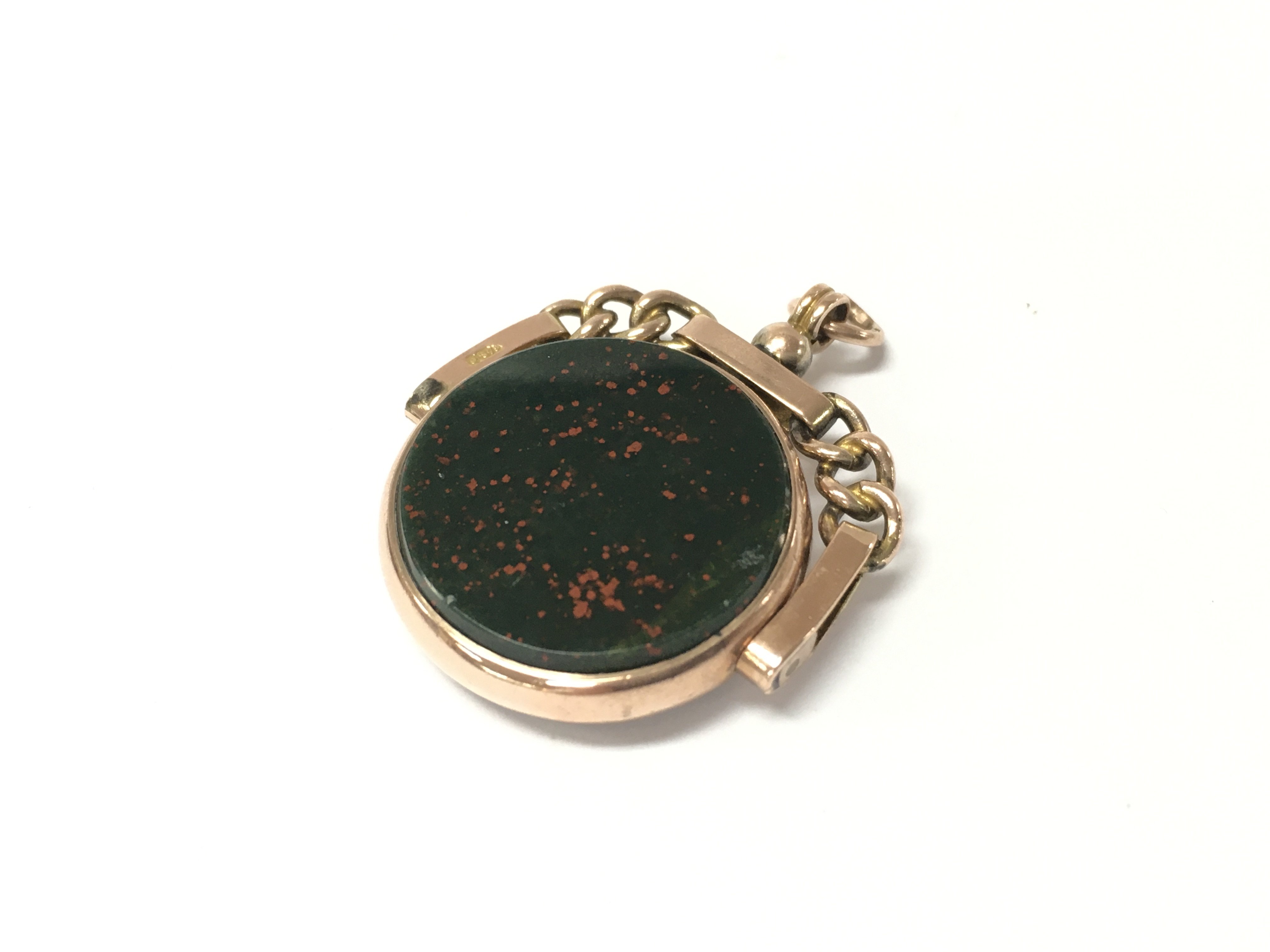 A 9ct gold fob set with bloodstone and another red stone, Approx weight 10.71 grams.