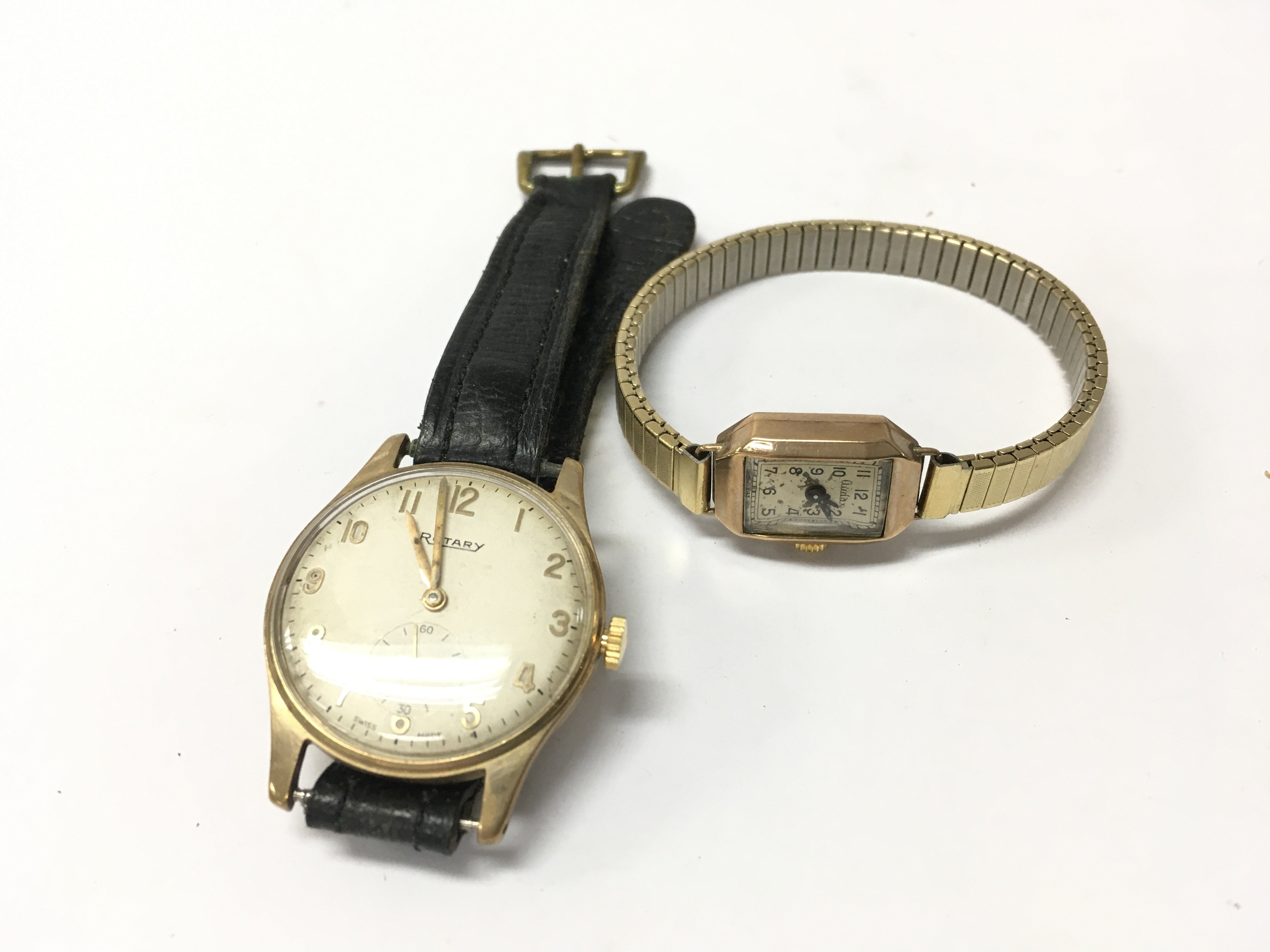 Two gold cased watches.