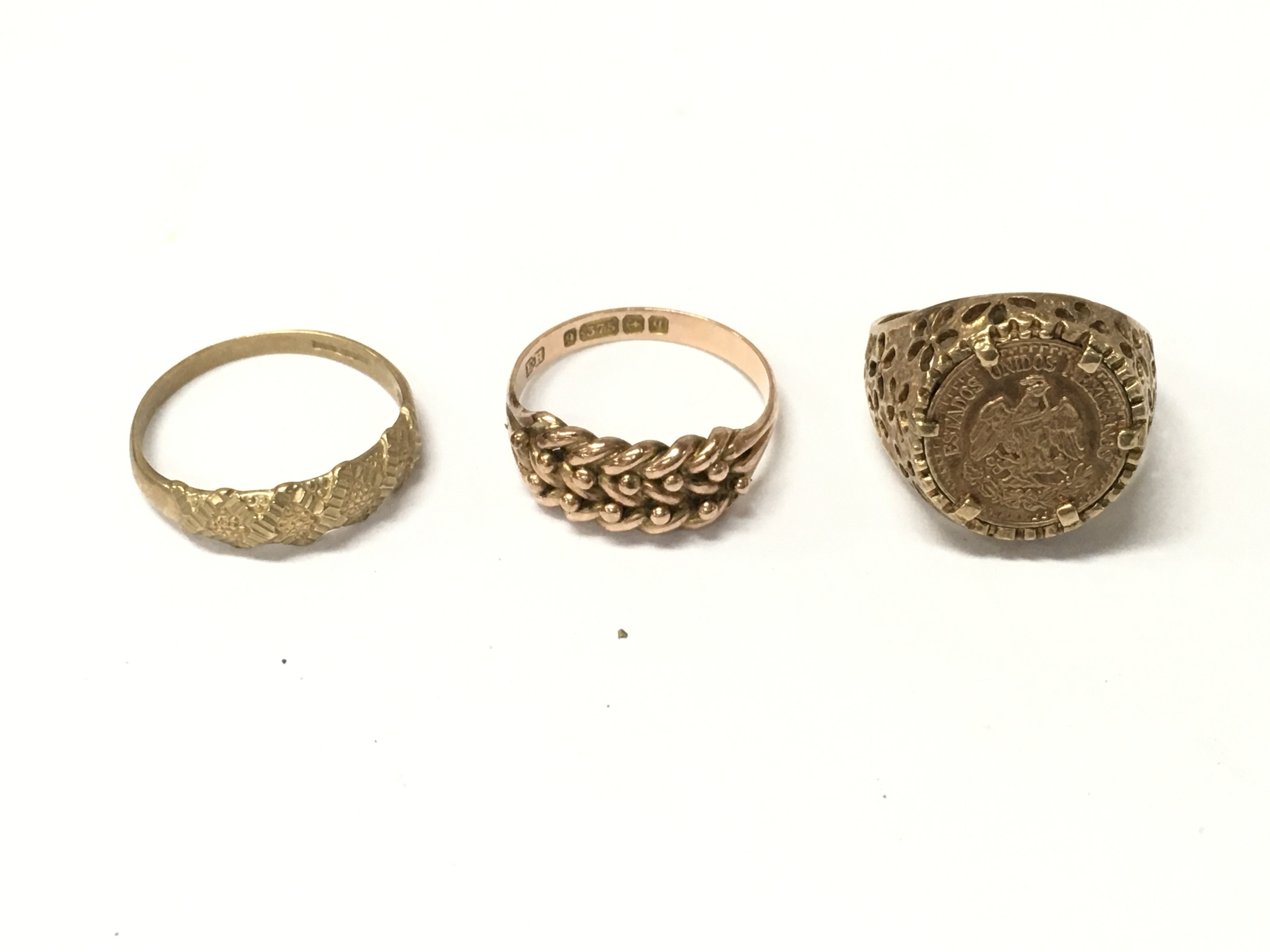 Three 9ct gold rings, Approx weight 8.47 grams