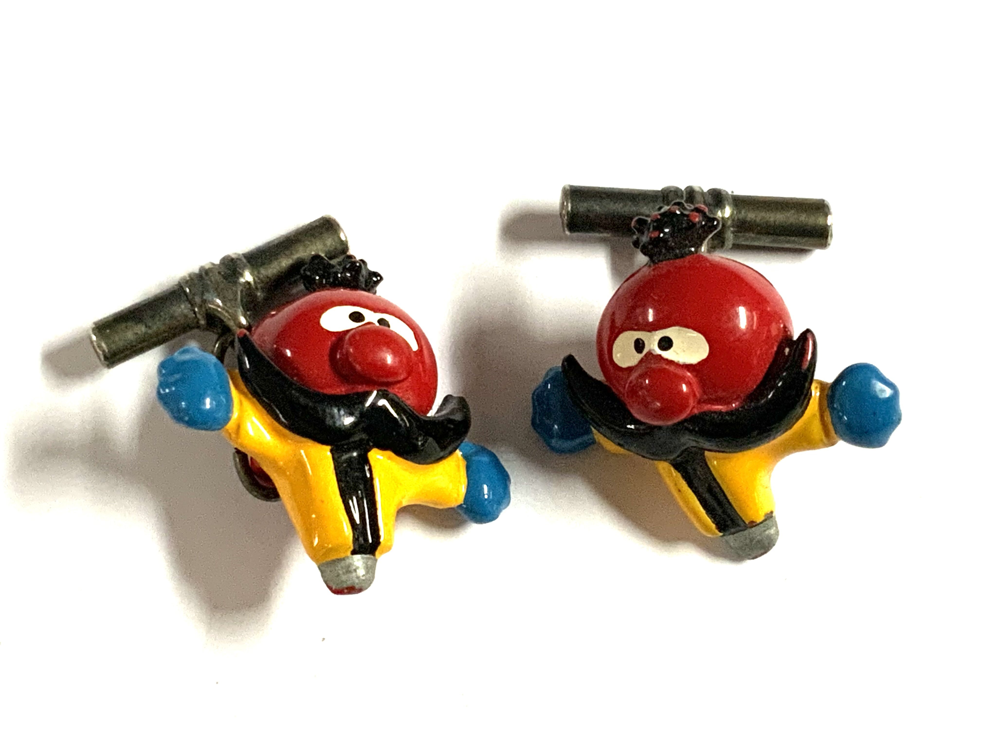 A pair of vintage Zebedee, Magic Roundabout white metal cufflinks. (A)