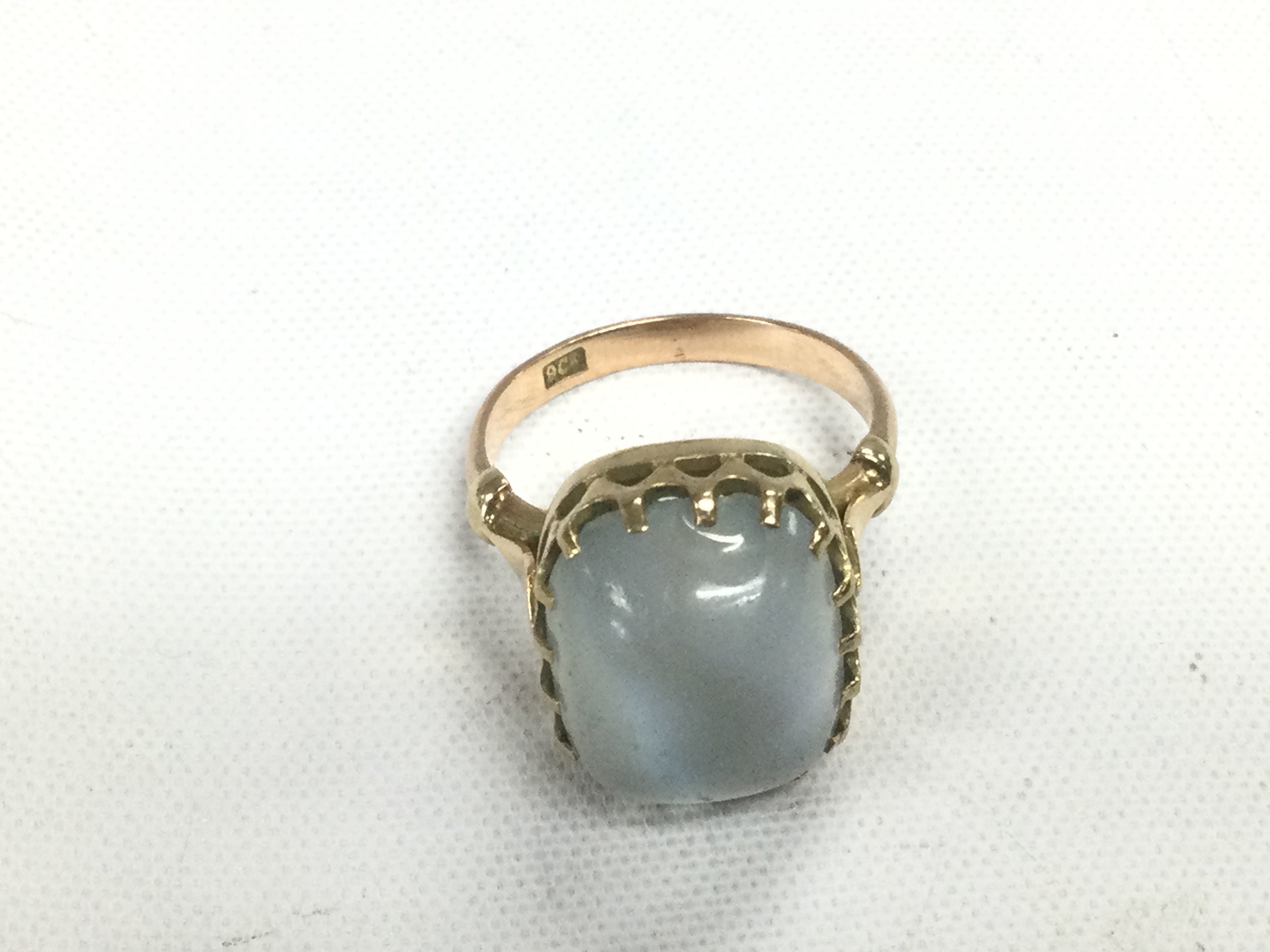 A 9ct gold ring set with an opal, approx 5g and approx size L. Shipping category A.