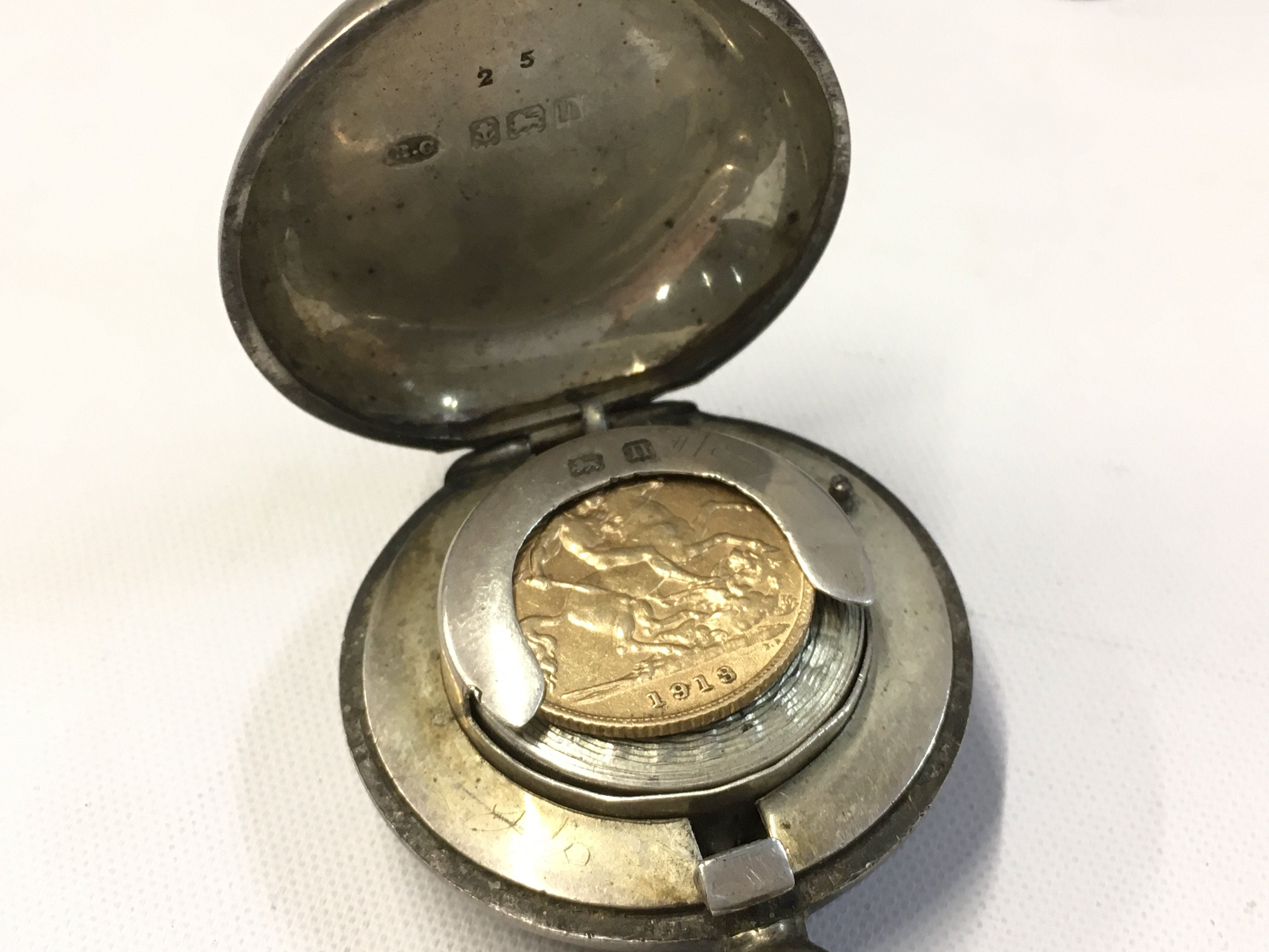 A 1913 gold half sovereign . Postage category A