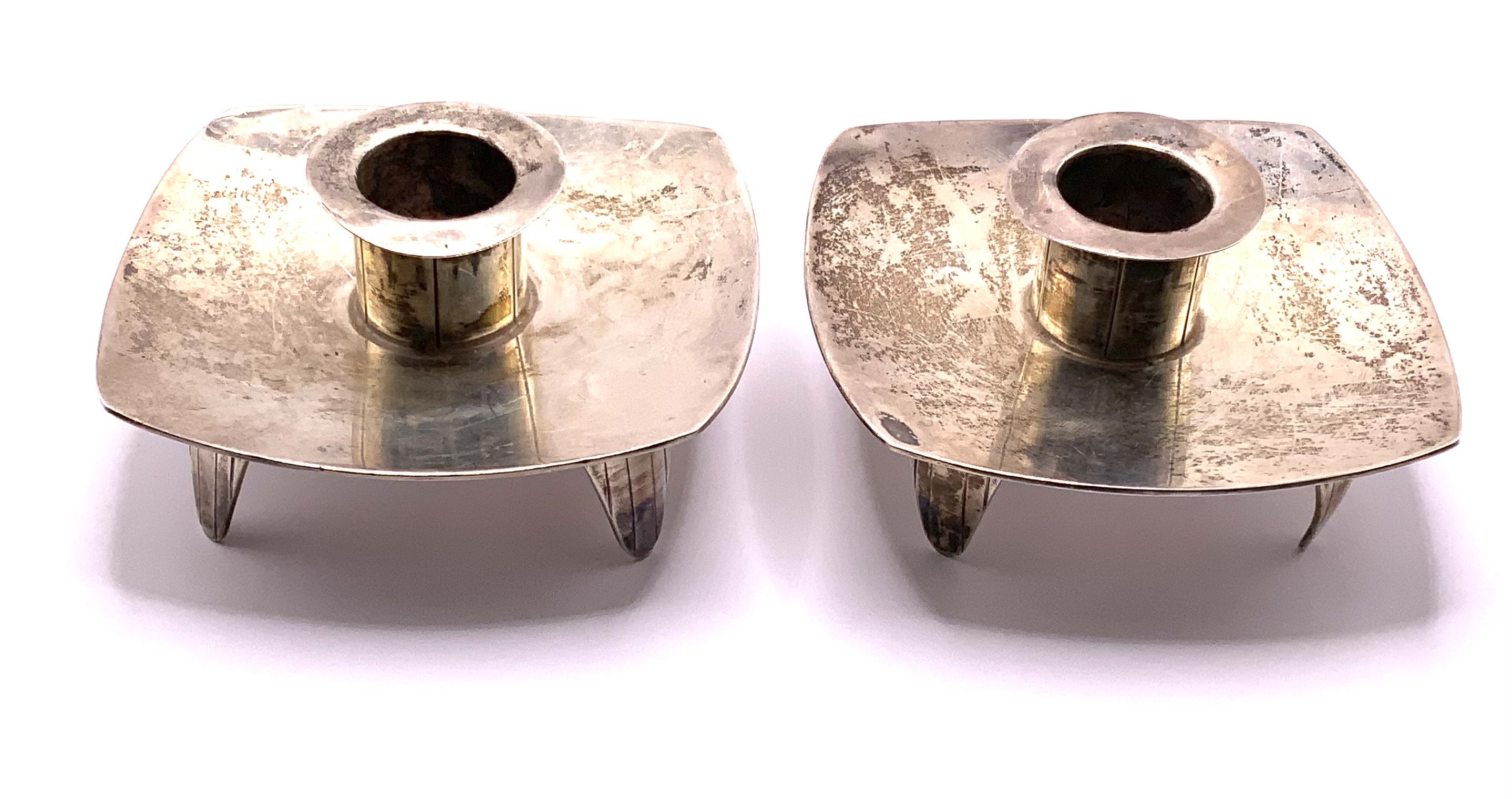 A pair of hallmarked silver candlesticks, mars for London 1960. A.S. (A)