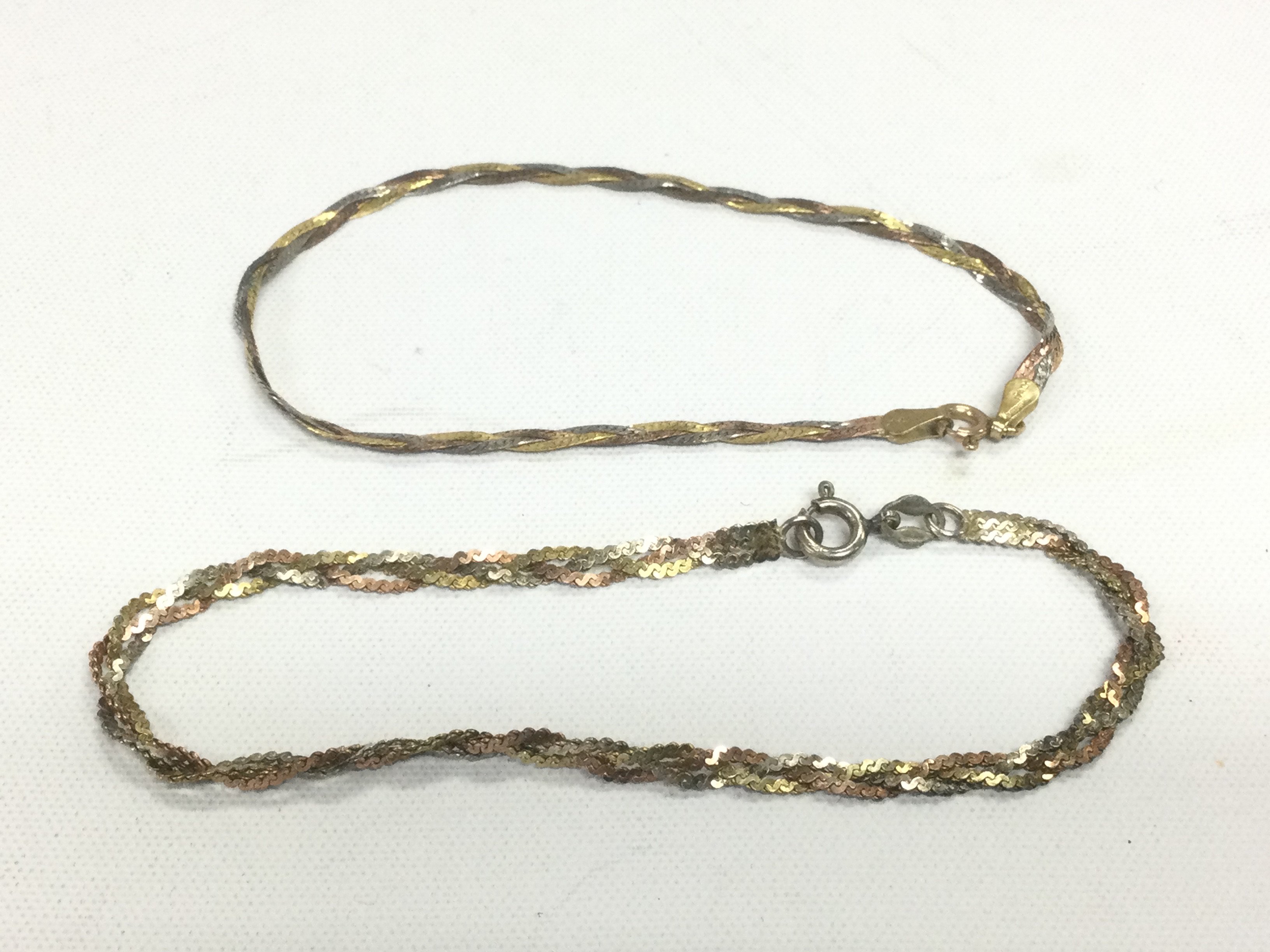 Two tri colour bracelets, one gold, one silver. Shipping category A.