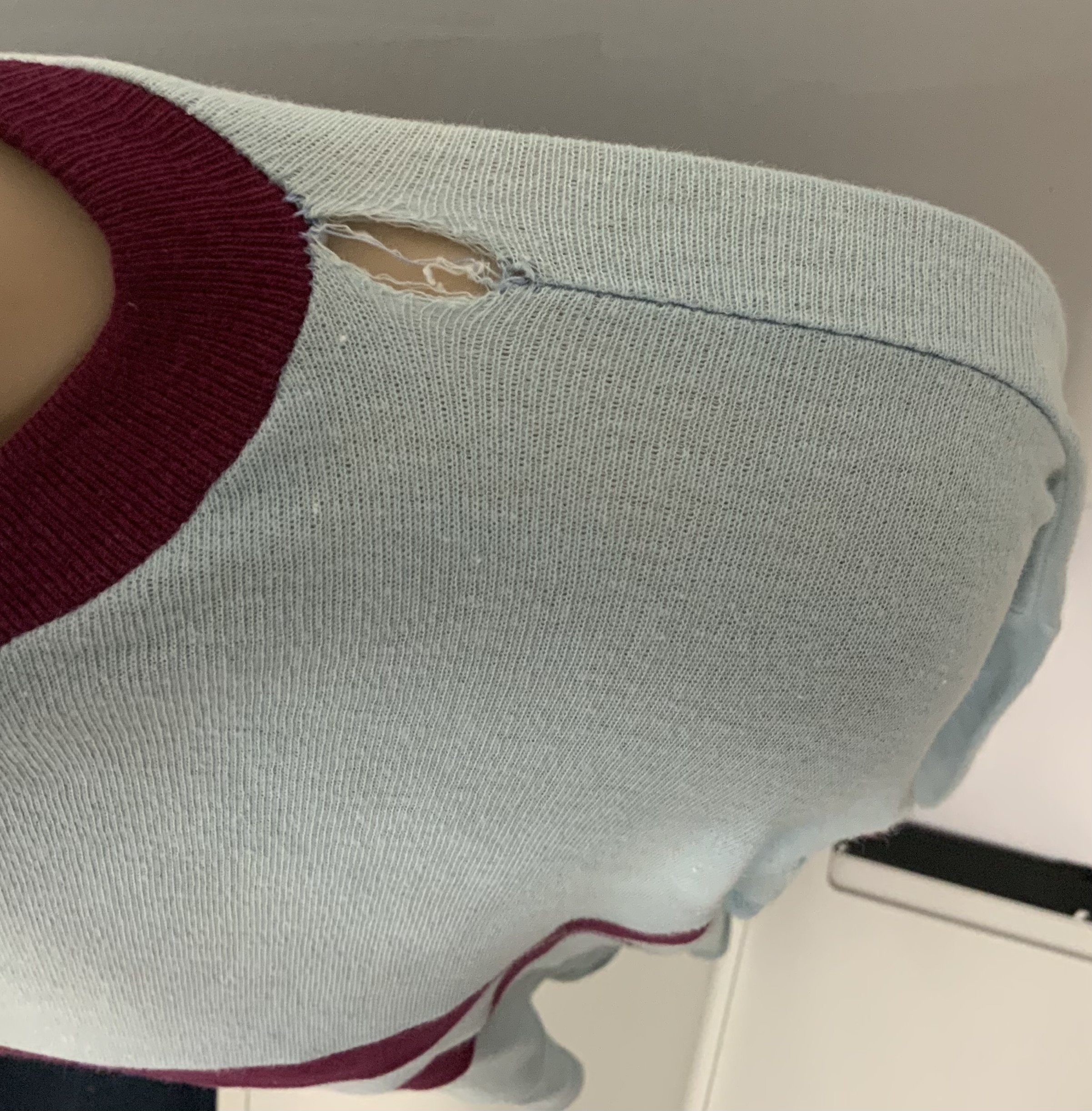 West Ham Original 1960s Football Shirt: Light blue with claret hoops. Tear near neck and marks near the shoulder. Original gold Bukta label washed out and small mark to rear. Genuine replica shirt nearly 60s years old. 