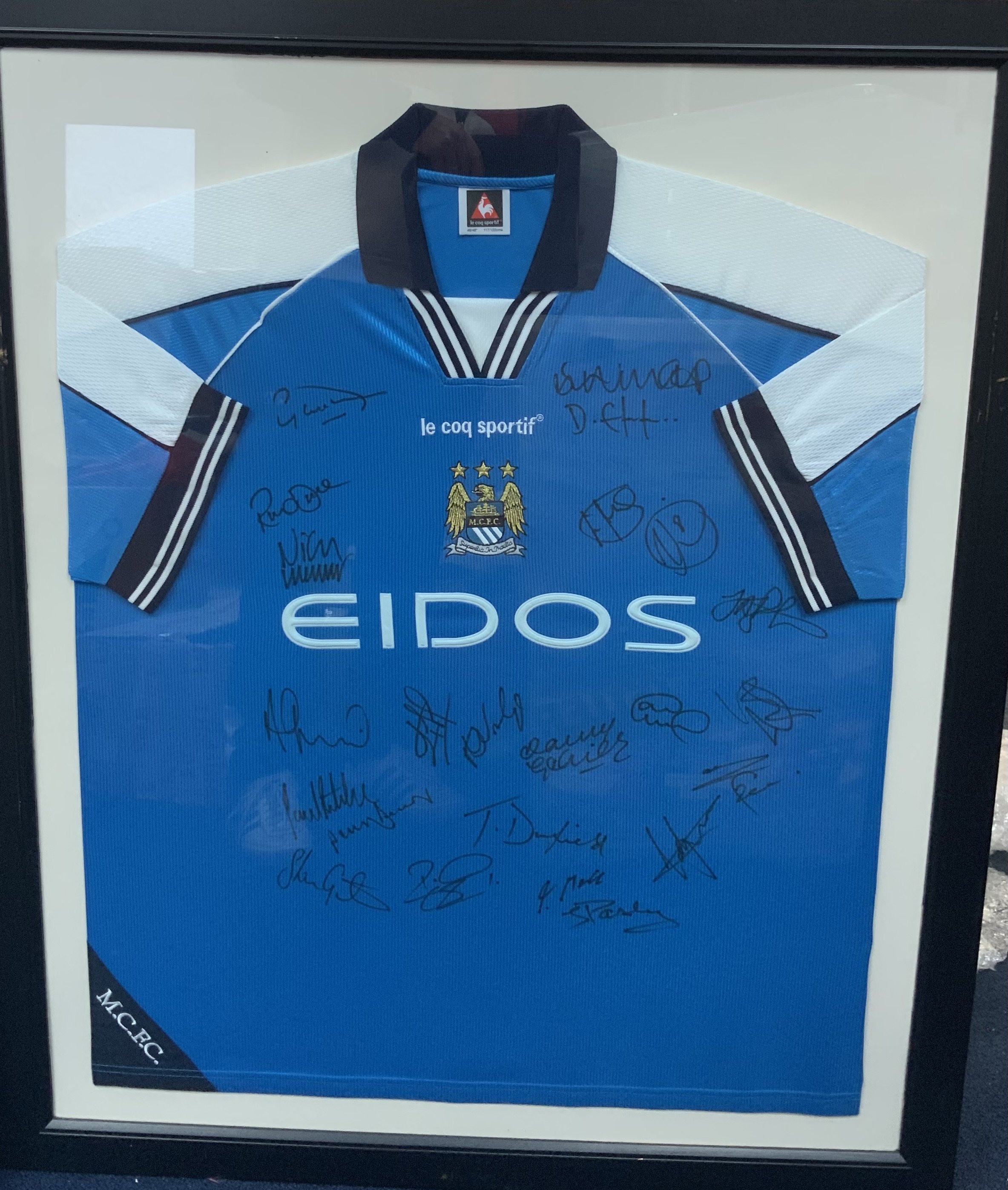 Manchester City 2000 - 2001 Framed Signed Football Shirt: Squad signed home size 46/48 shirt. Frame measures approximately 40 inches by 33 inches. No COA. Not for posting. 