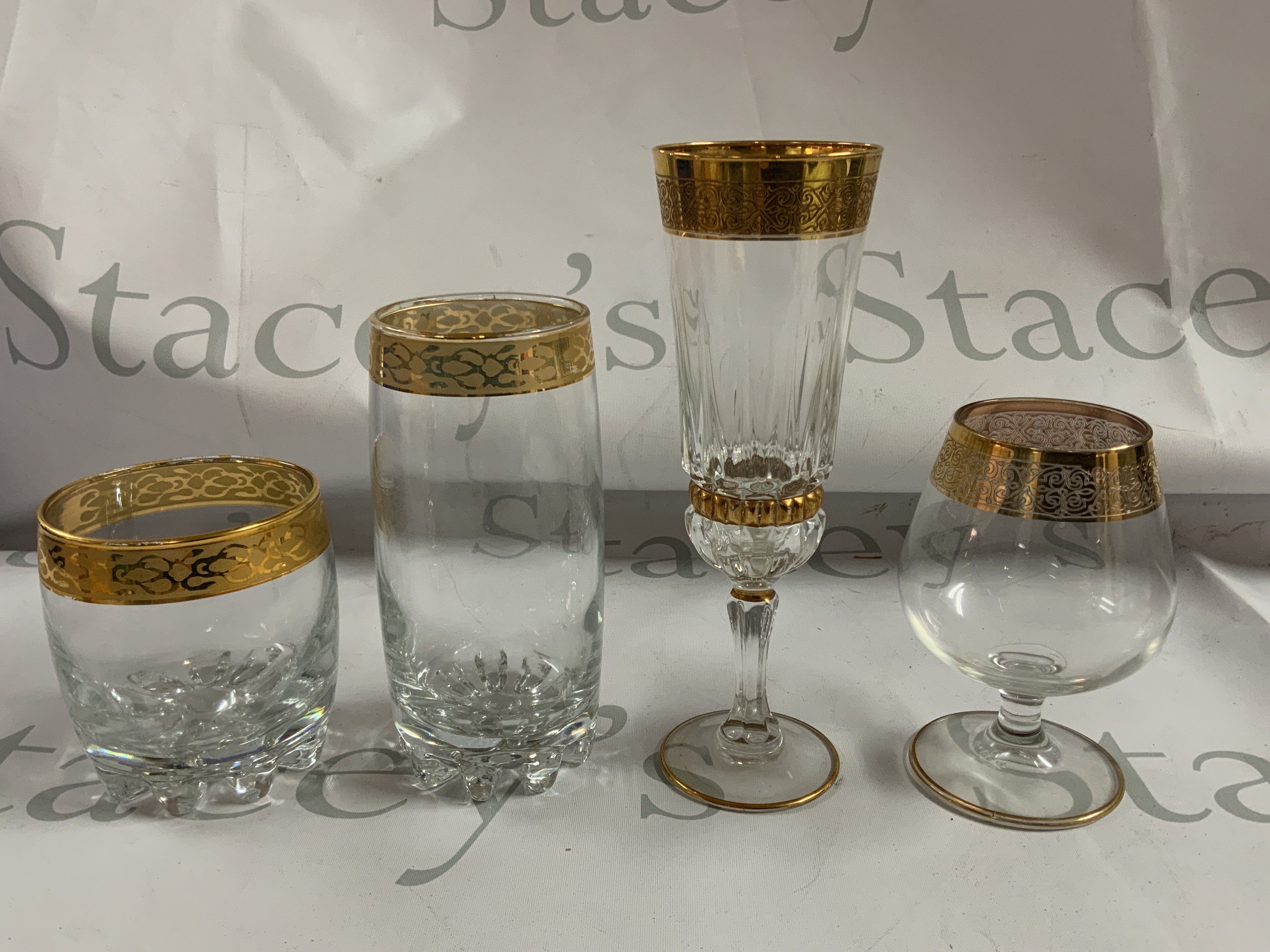 A collection of gilt decorated glassware. (30)