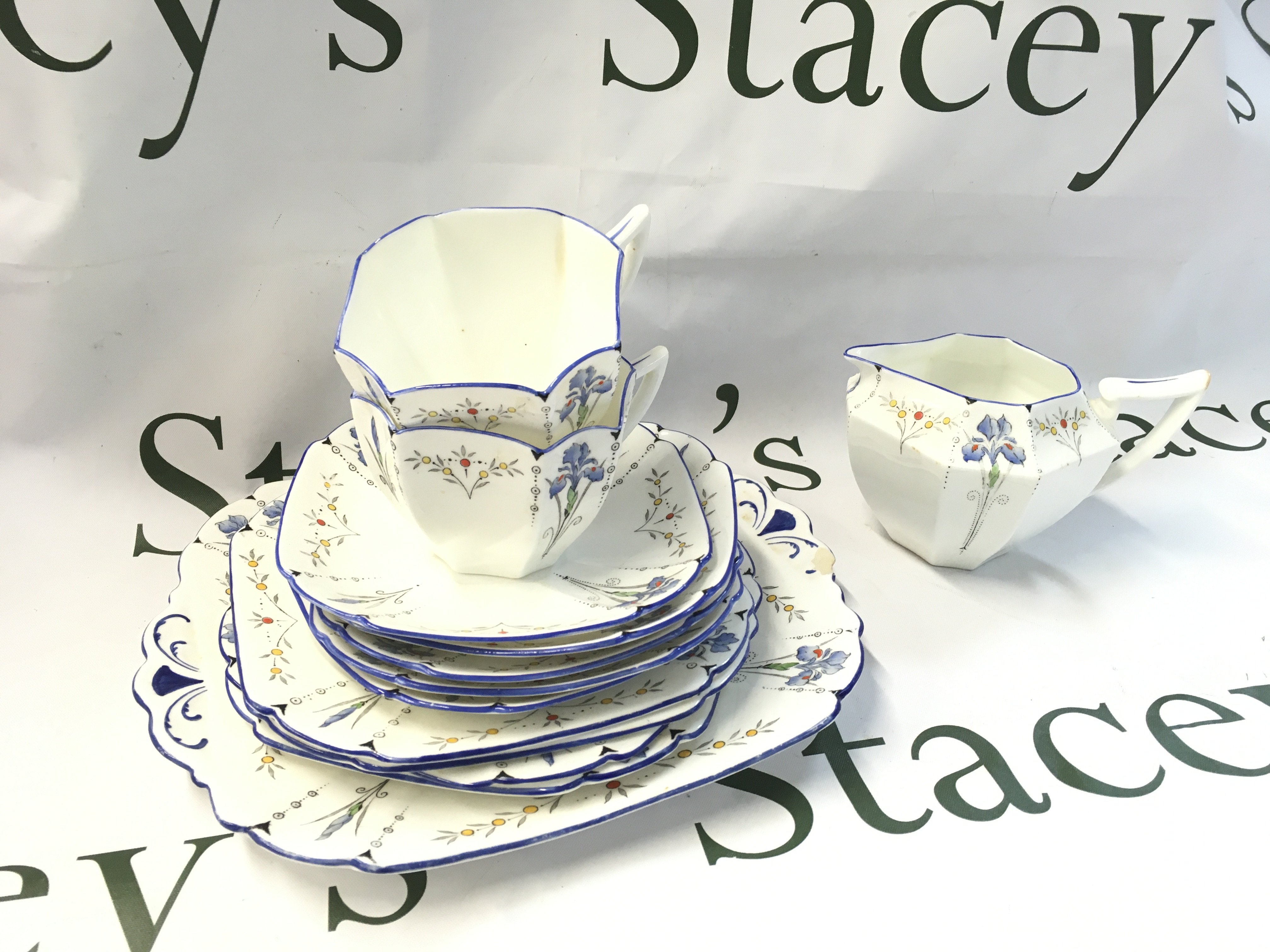 A Part Shelly tea set including saucers and cups. Some damage