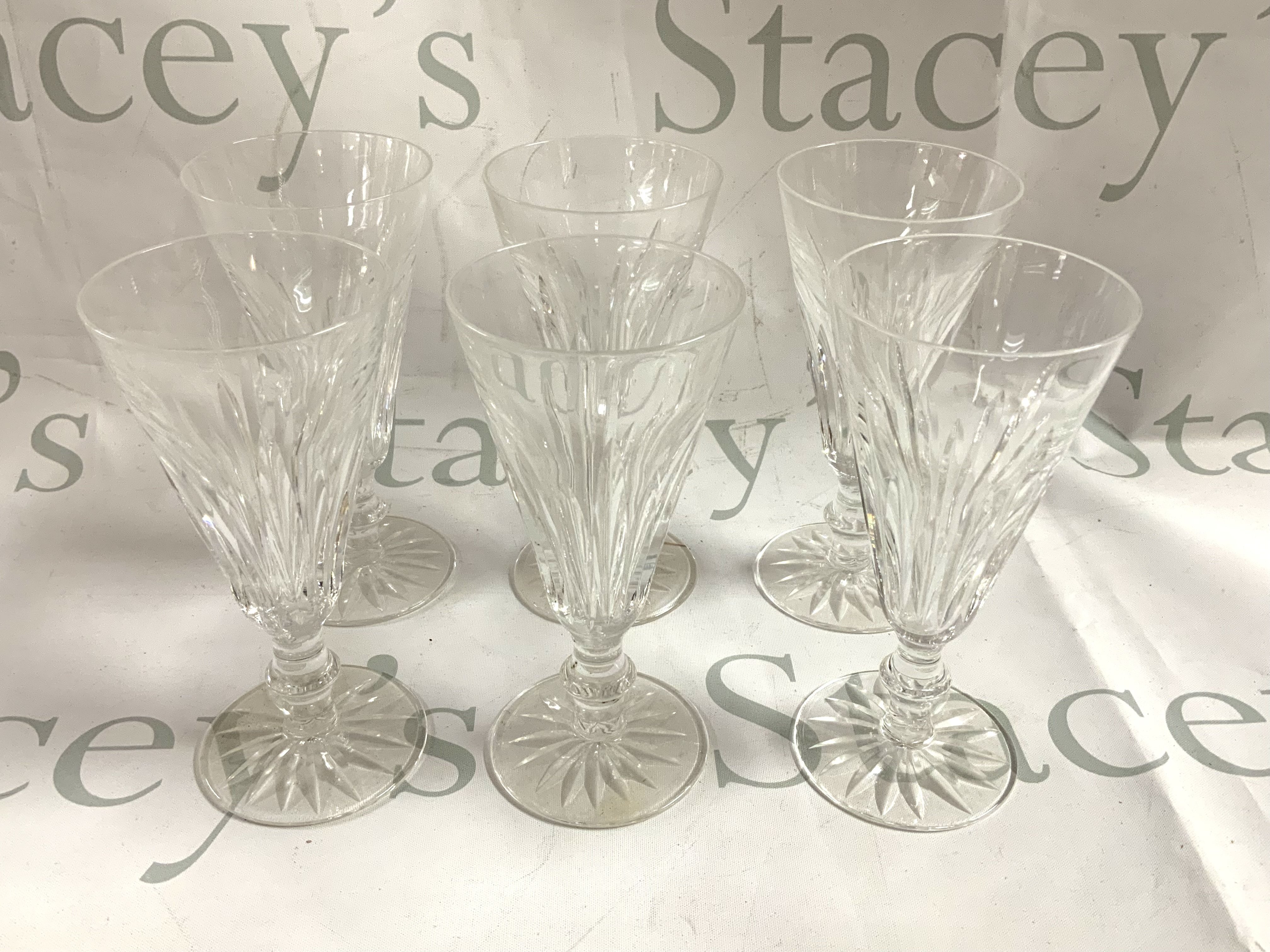 2 sets of 6 Waterford crystal drinking glasses . (D)