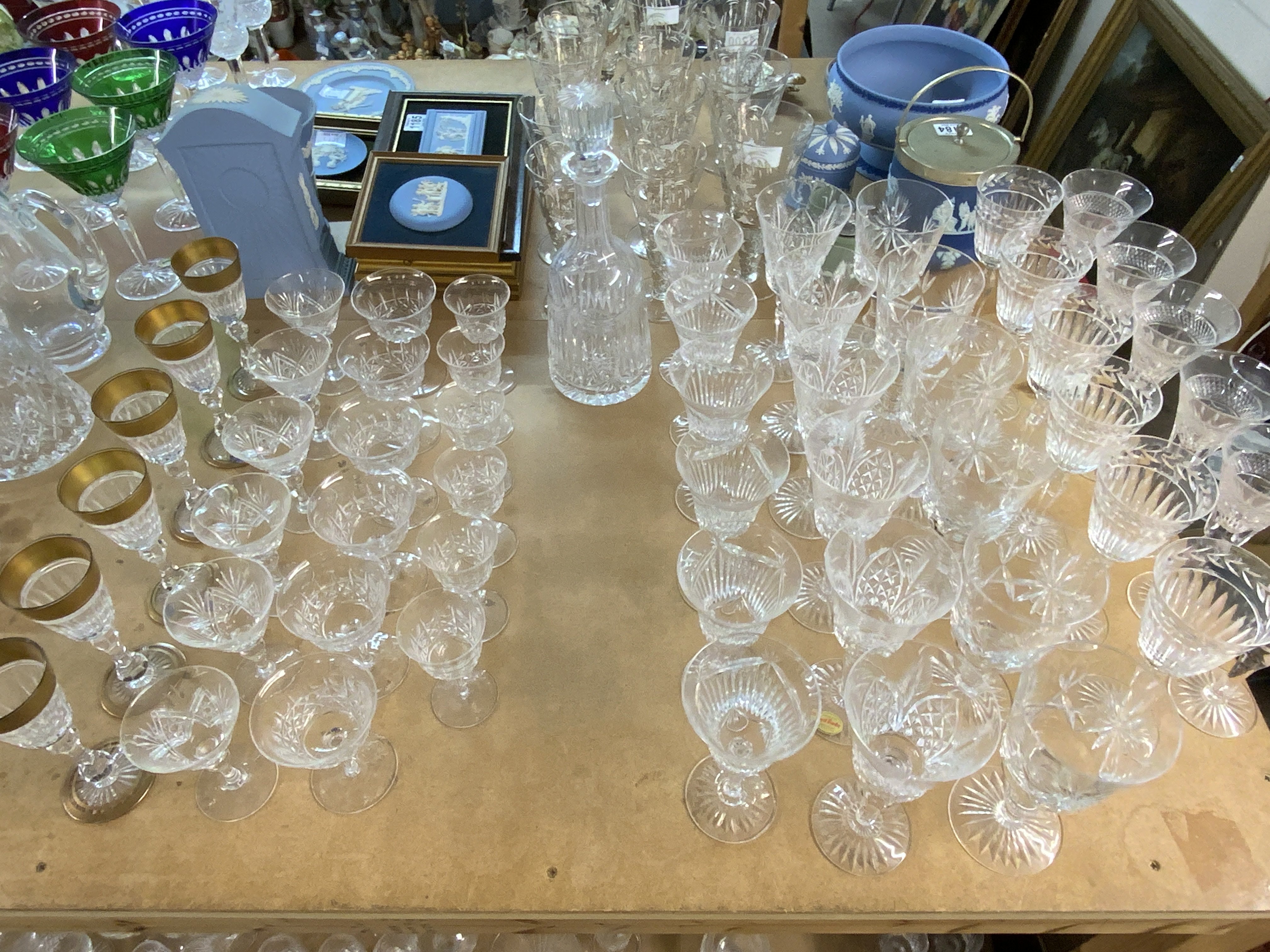 A good collection of crystal glassware, Tudor, Stuart, Royal Brierley, Webb. X9 sets of 6 plus 1 decanter (including a set of 6 Stuart crystal with gold floral design border). (D-postage not avaliable for this lot.).