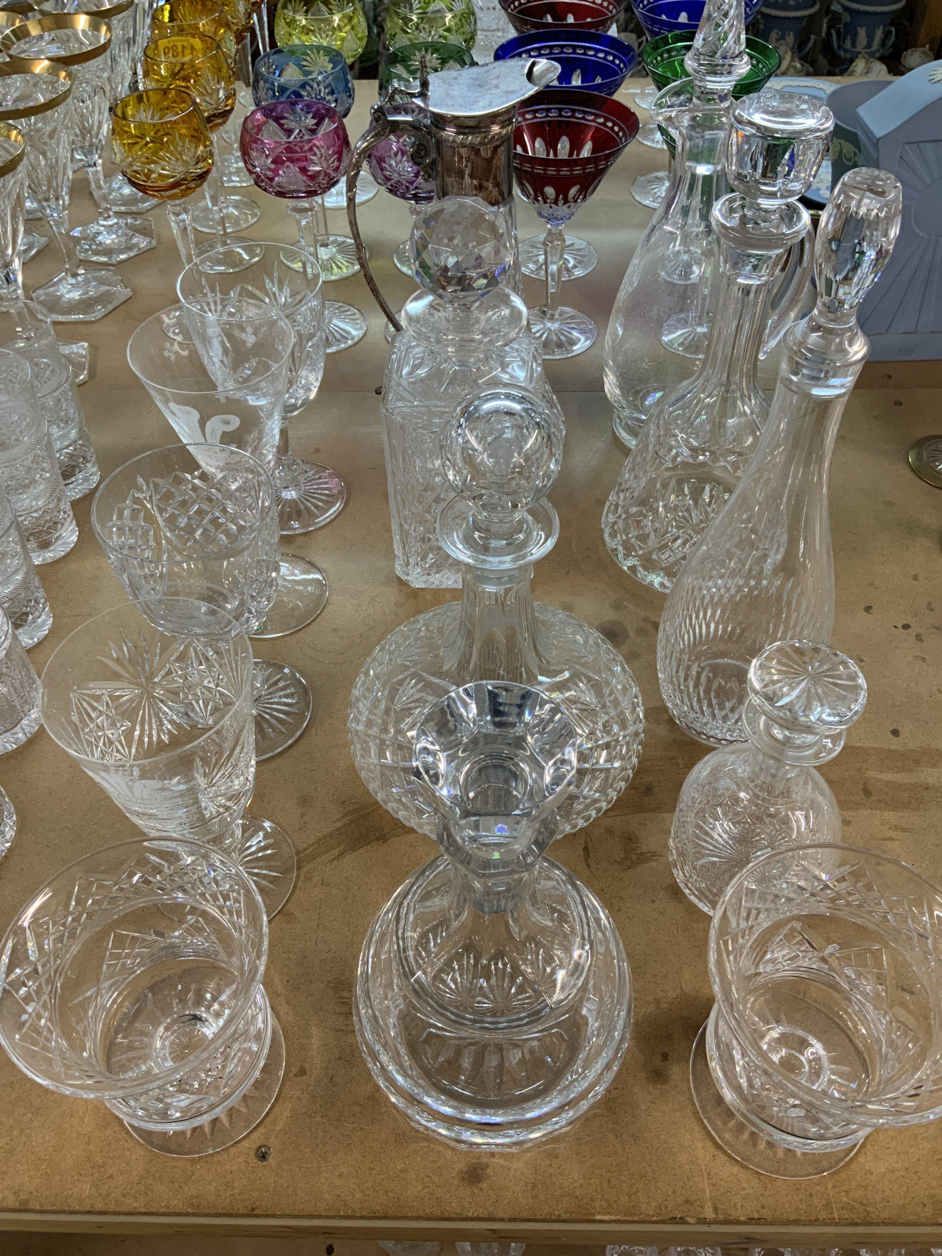 A good collection of crystal and glassware to include decanters, oversized etched glasses. Stuart and Webb crystal etc. (D- postage not avaliable for this lot).