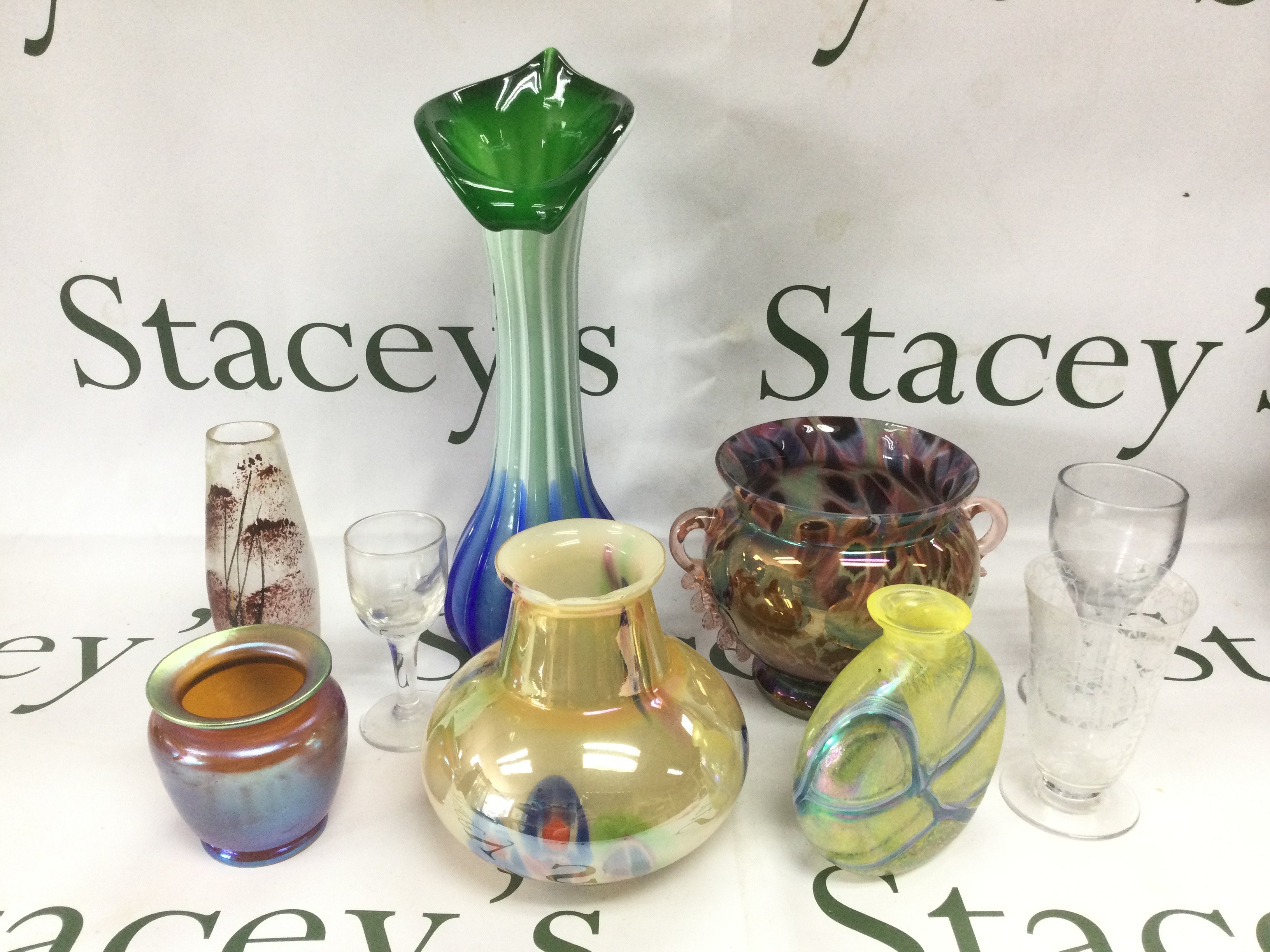 A collection of glassware including a Baccarat drinking glass a/f, jack in the pulpit vase etc. Shipping category D.