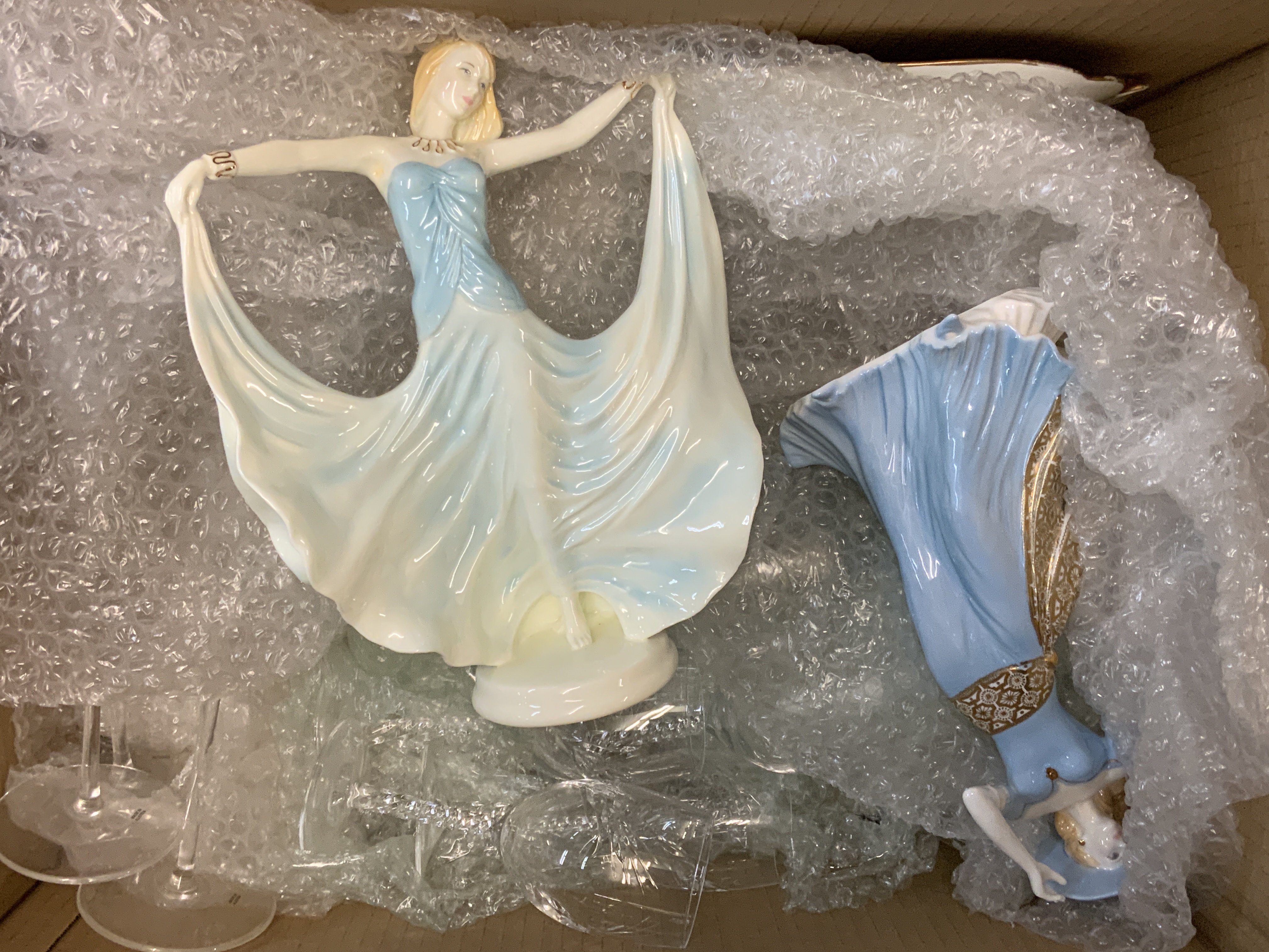 A mixed lot of porcelain and glassware to include 2 collectors figures, 2 St Louis crystal glass candlesticks etc.