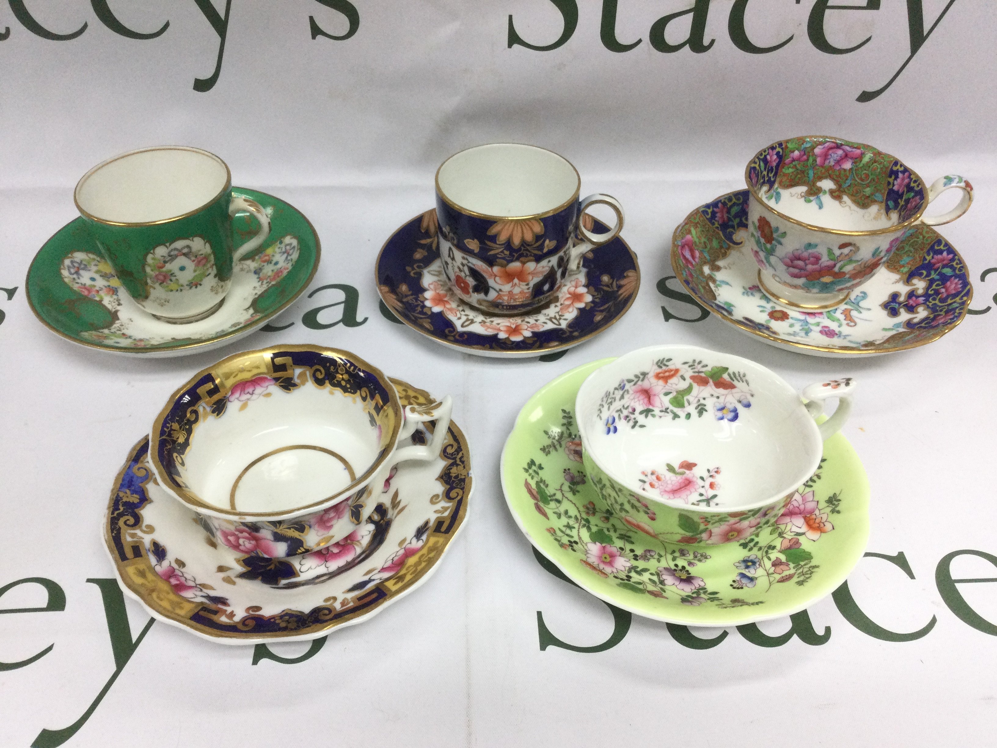 Five cabinet cups and saucers. Shipping category D.