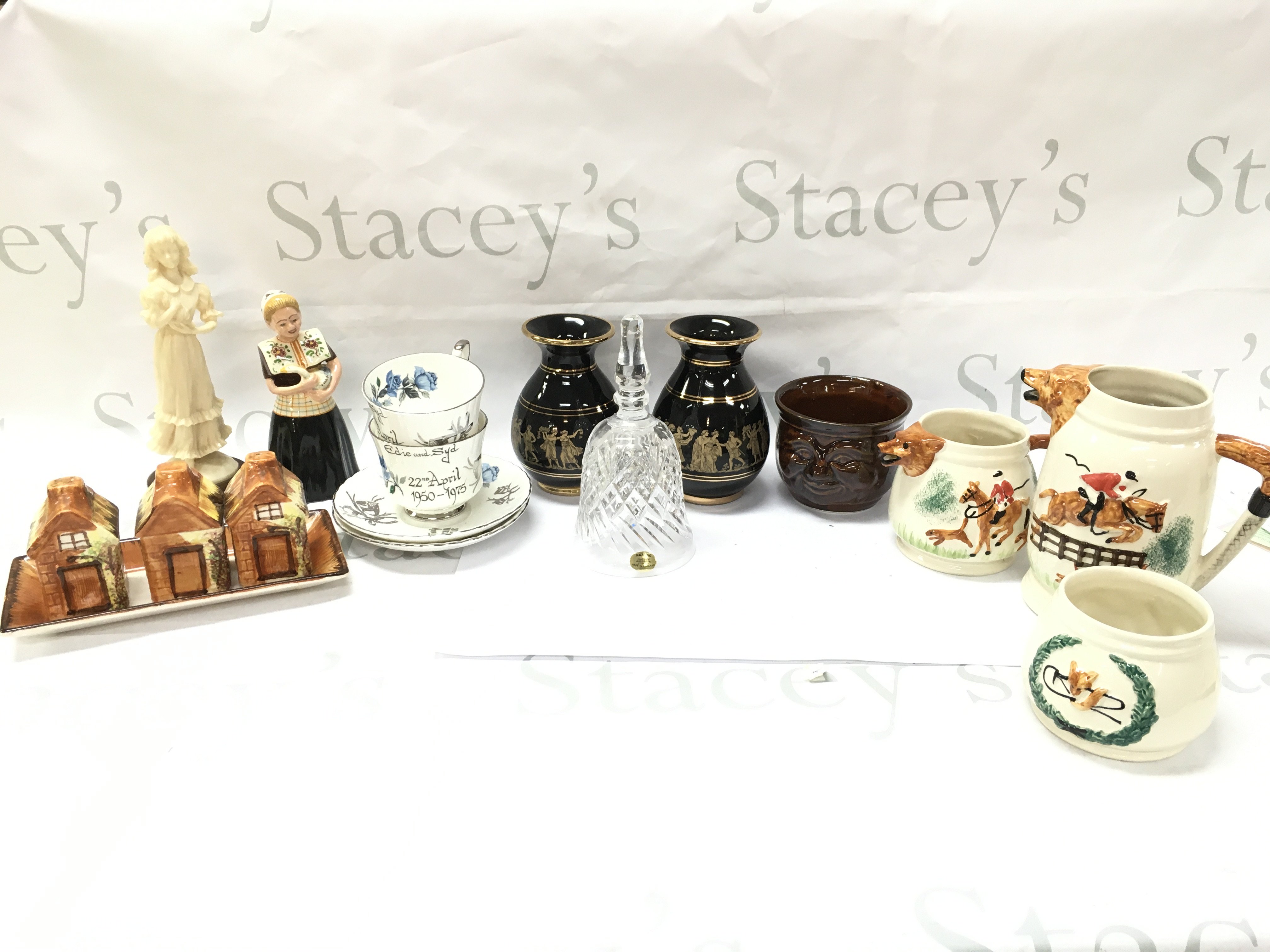 A collection of ceramics including Bols ceramic figure, Spathas Keramik vases, fox hunting jugs , Royal Stafford silver wedding cups and saucers. This lot cannot be posted