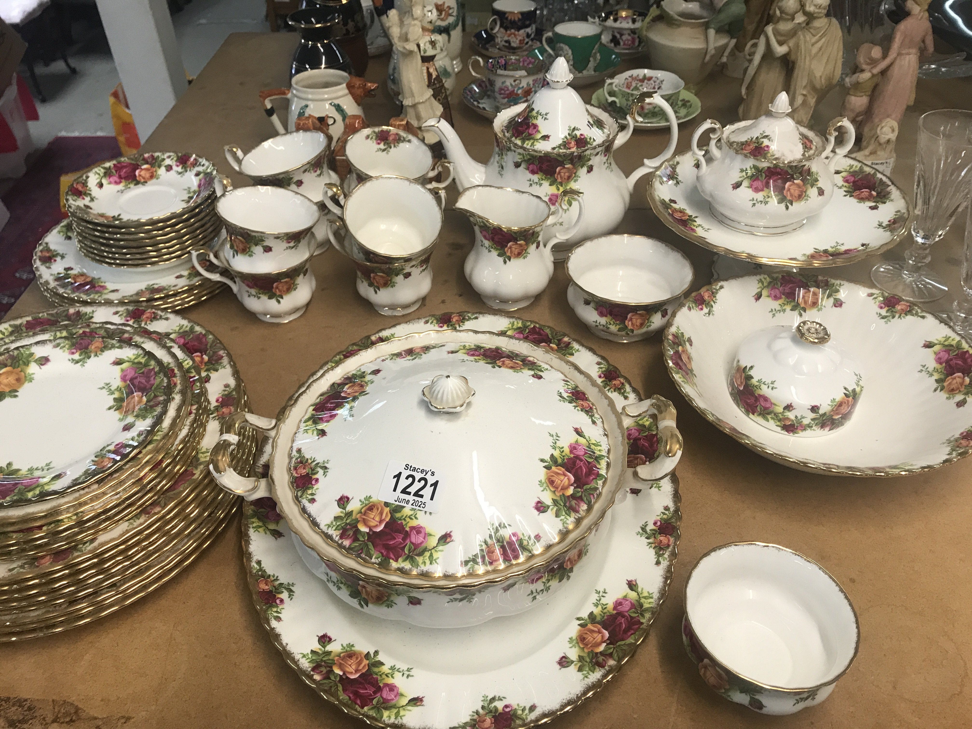 A Collection of Royal Albert County rose including tureens serving plates tea pot cups saucers Side plates .