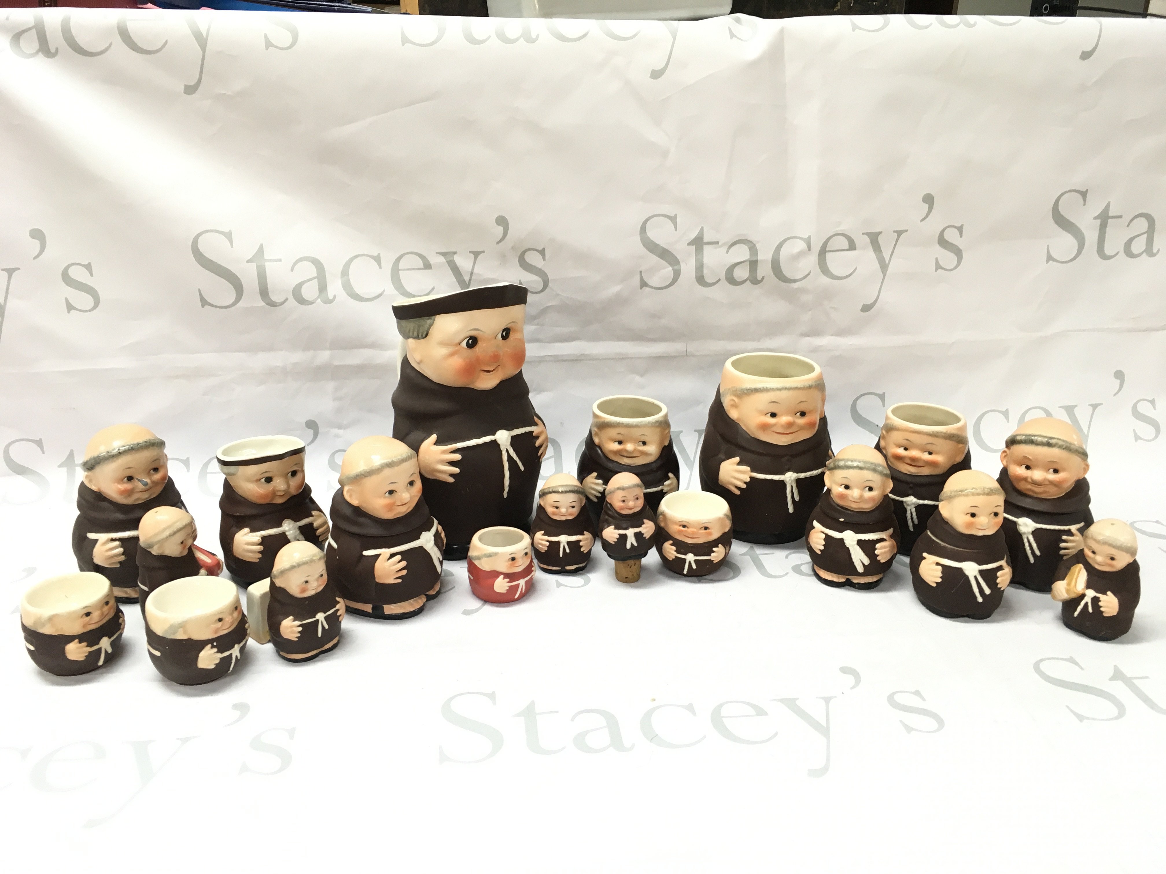 A collection of Goebel ceramic Friar Tuck monk figures, Rye Pottery cats and a Stockholm . This lot cannot be posted