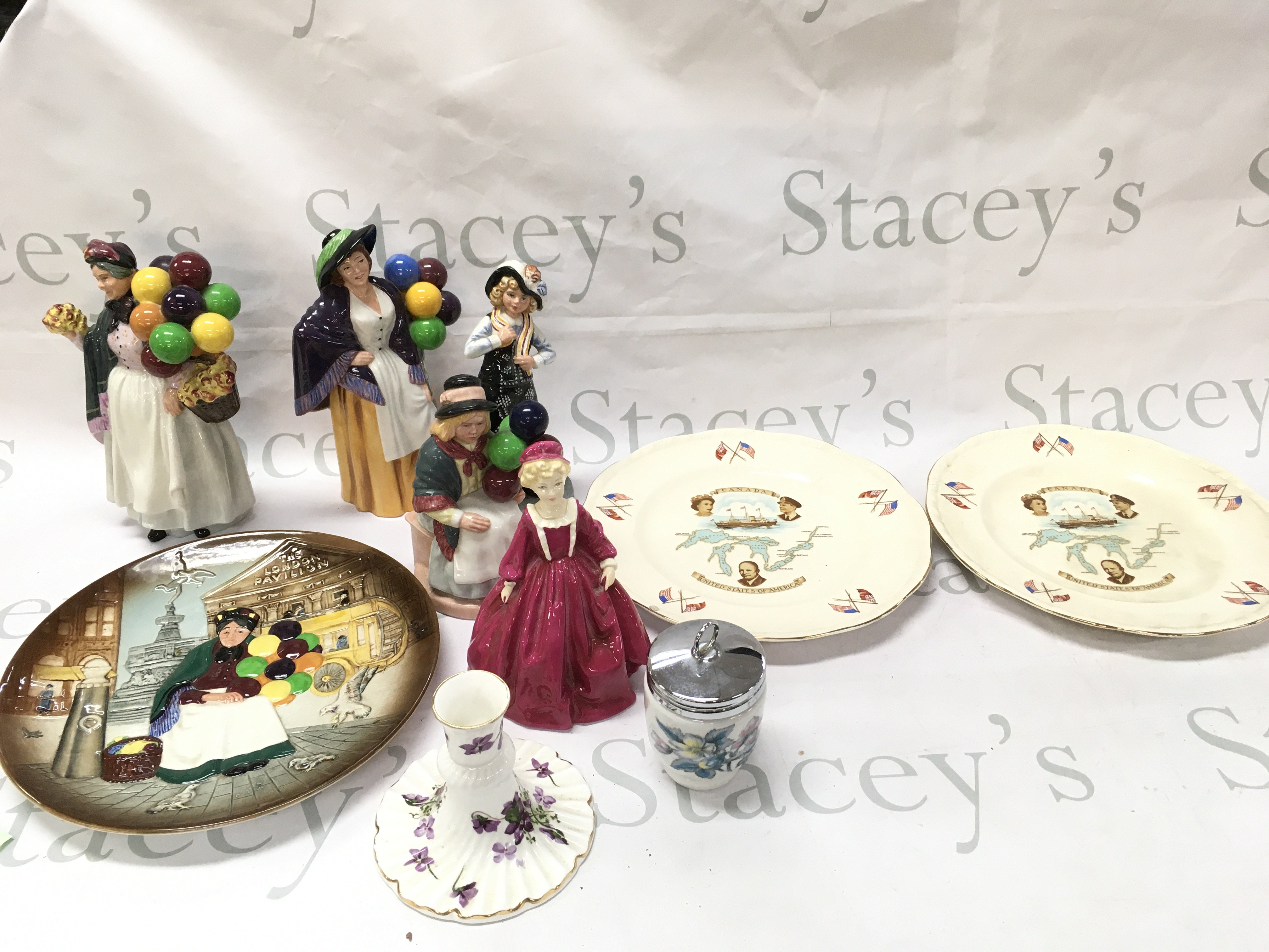 A collection of Royal Doulton balloon seller figures and plate , St Lawrence Seaway commemorative plates , Royal Worcester , Hammersly. This lot cannot be posted