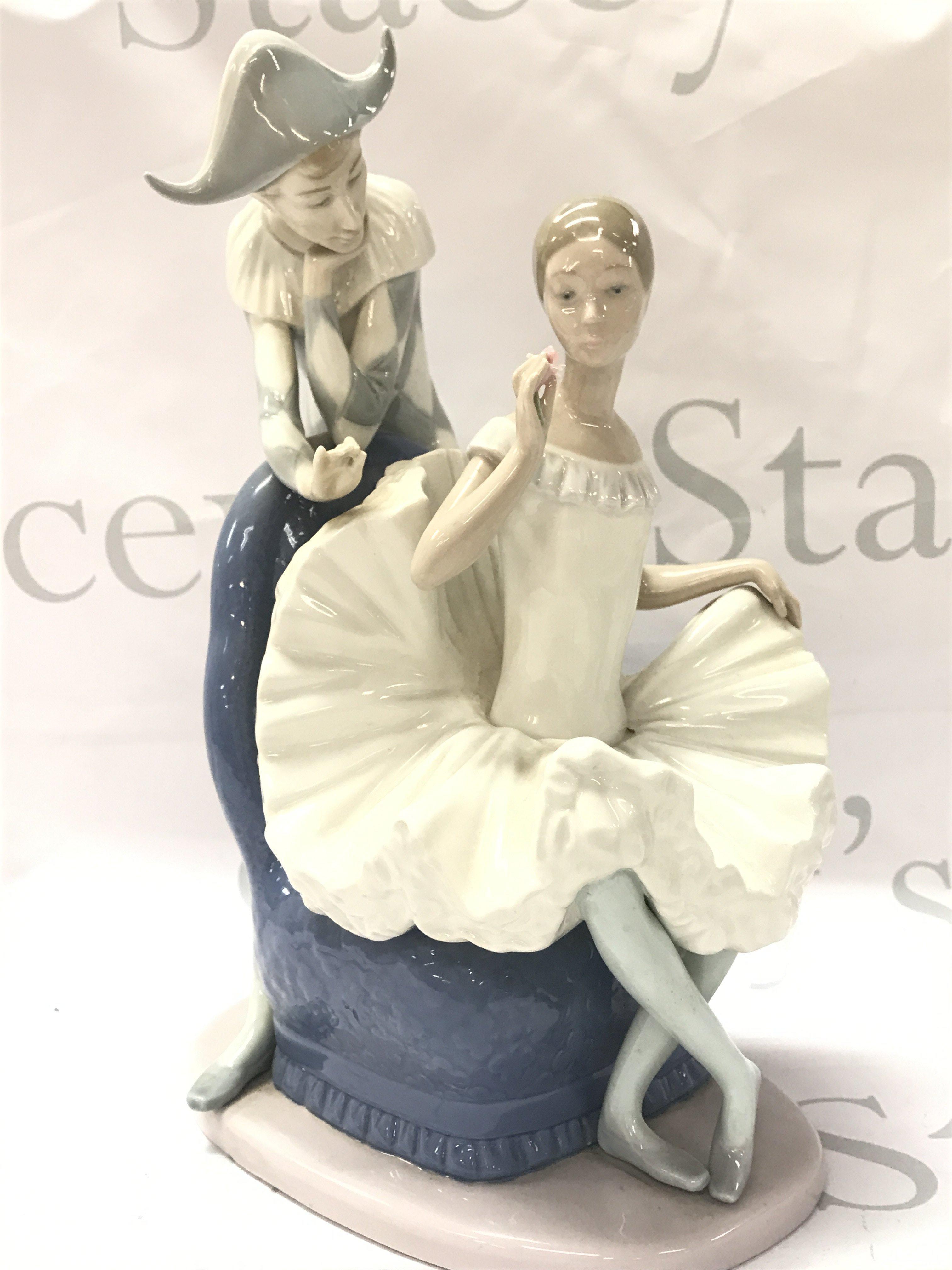 A Nao porcelain figure group, a Dream come true . 30cm tall. This lot cannot be posted