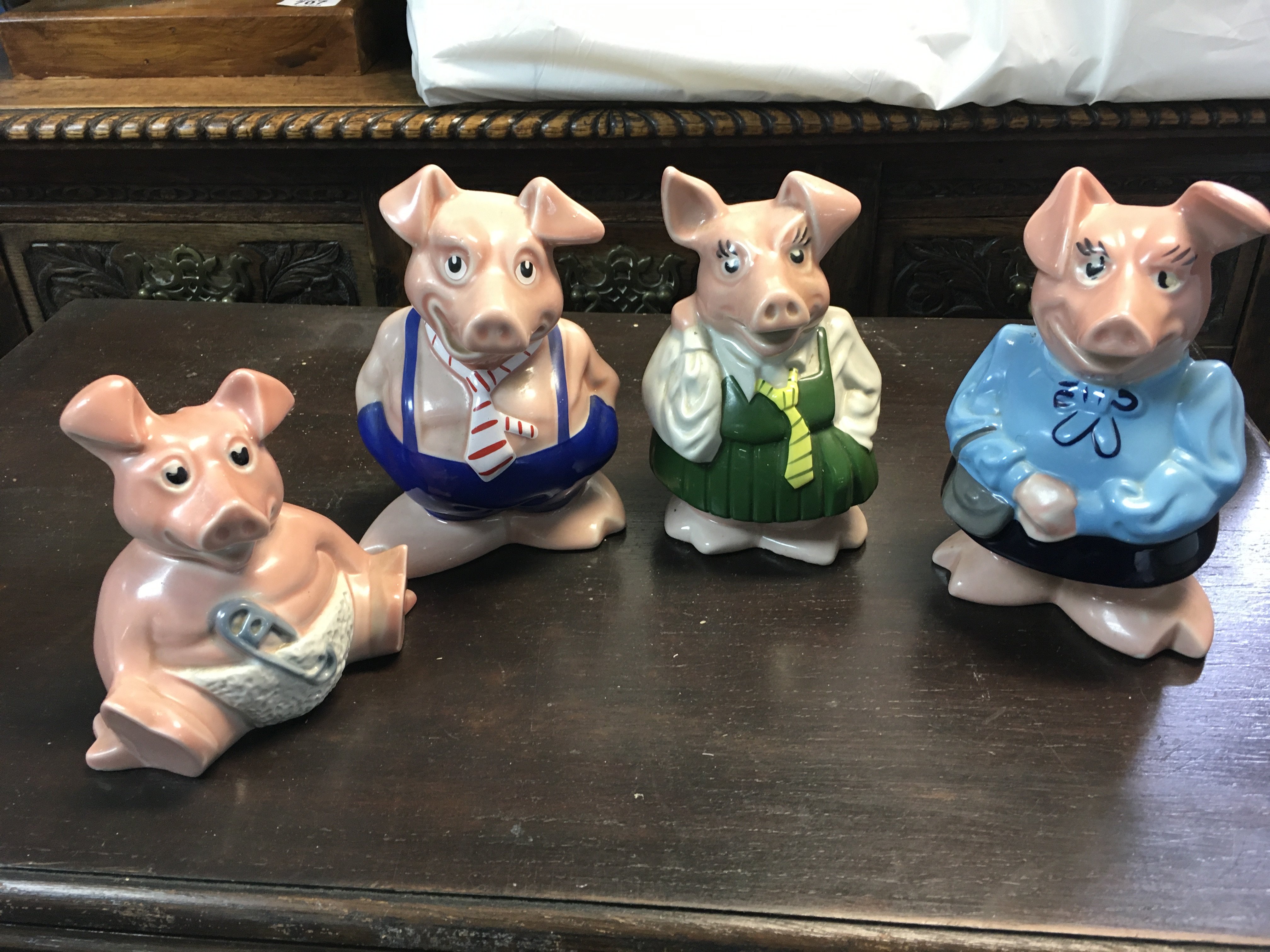 A set of ceramic Wade NatWest piggy moneybanks. This lot cannot be posted