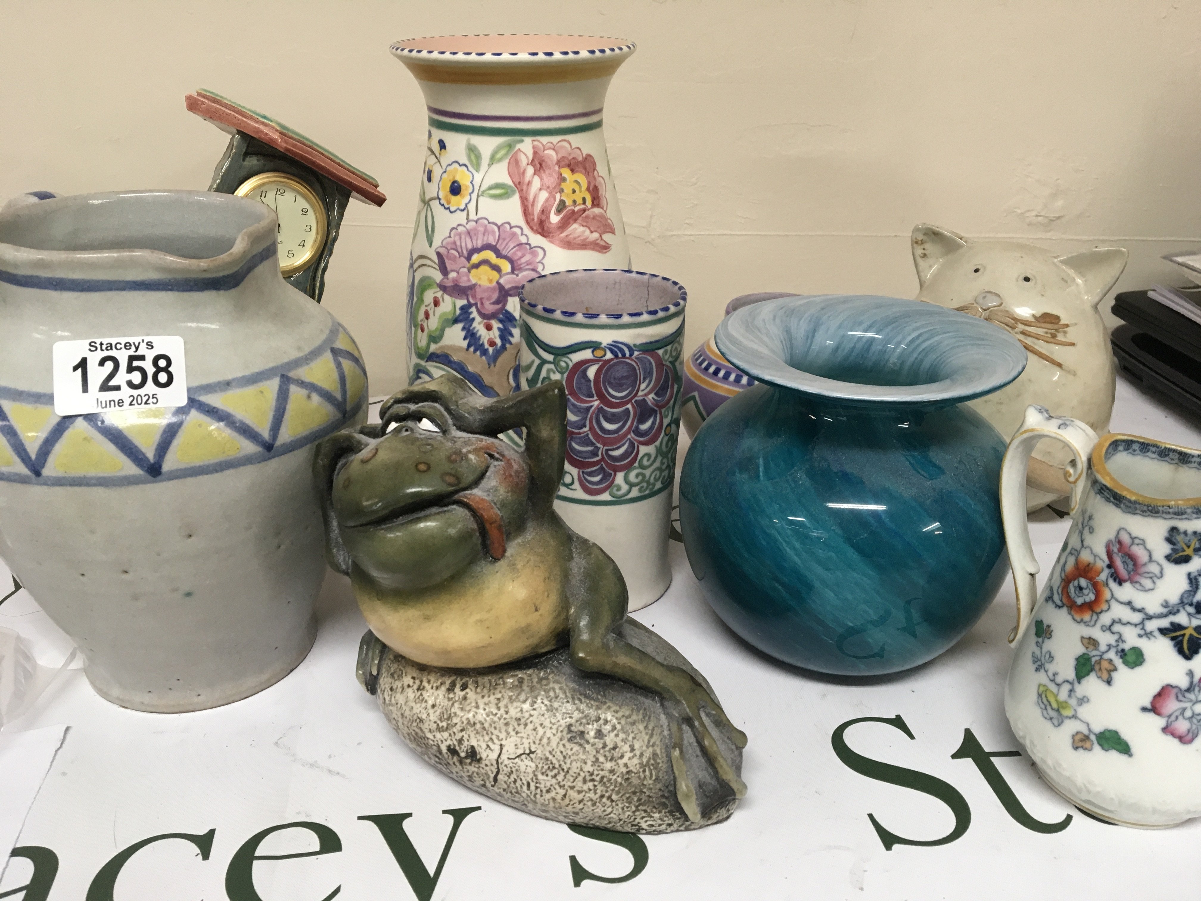 A collection of Poole pottery and other modern contemporary ceramics.